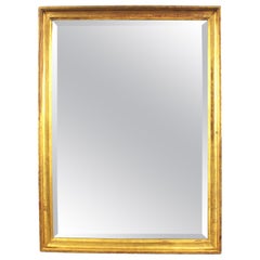 Spanish Empire Rectangular Mirror in Gold Leaf Giltwood and Beveled Glass Spanish Empire Rectangular Mirror in Gold Leaf Giltwood and Beveled Glass