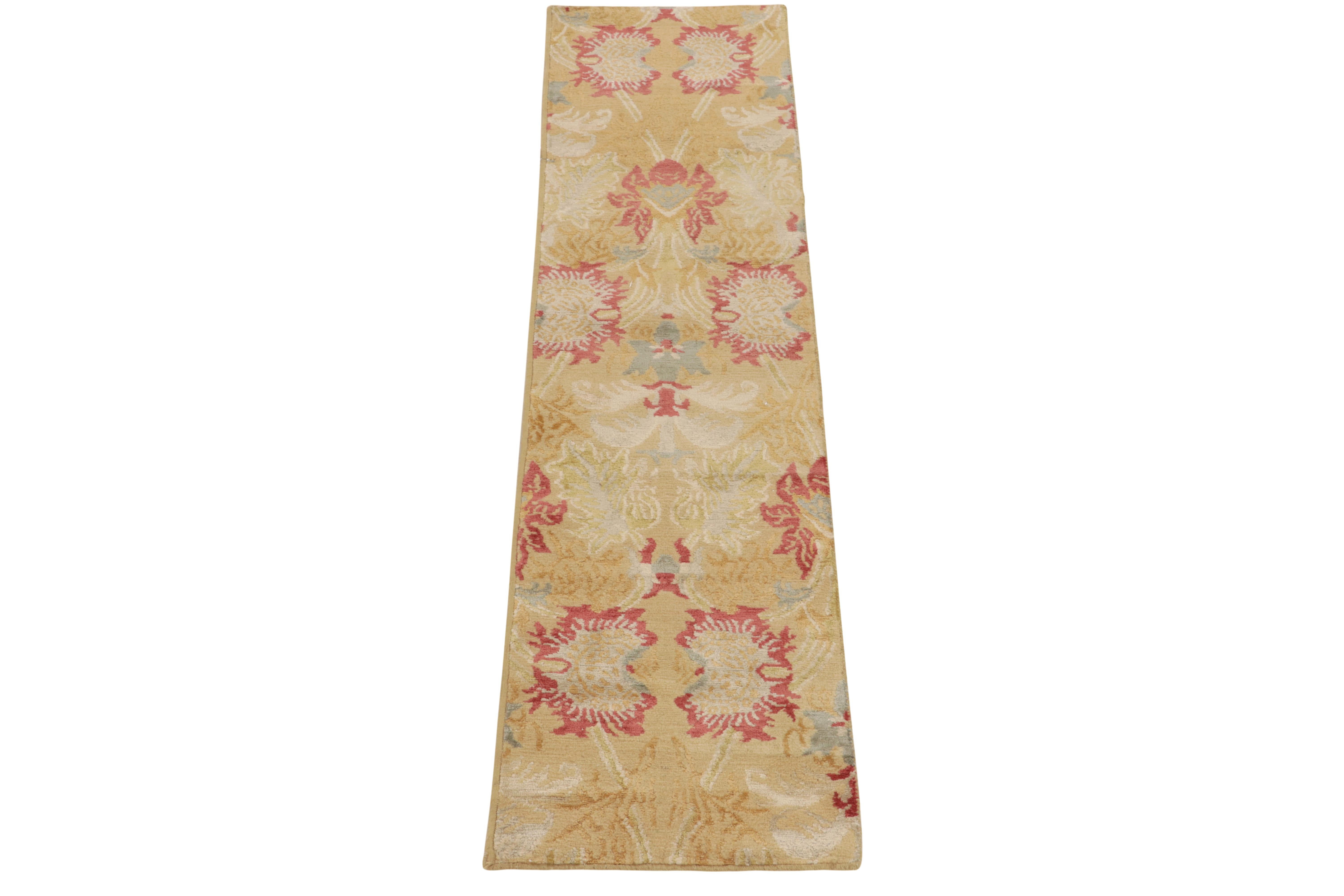 Hand-knotted in luxurious silk, a 1x6 contemporary runner from our European collection. The drawing carries our Toledo design inspired by Spanish antique floral rugs in an alluring play of gold, red, blue & silver-gray for a lustrous appeal. A