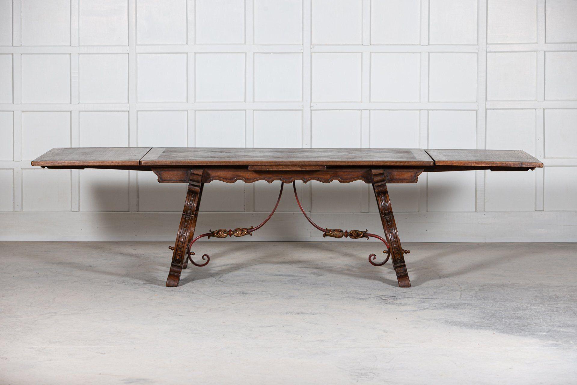 Circa 1940
Spanish extending oak & iron dining table.

Sku 1114
Extended W 296 x D 100 x H 75cm
Not extended W 170 X D 100 x H 75cm.