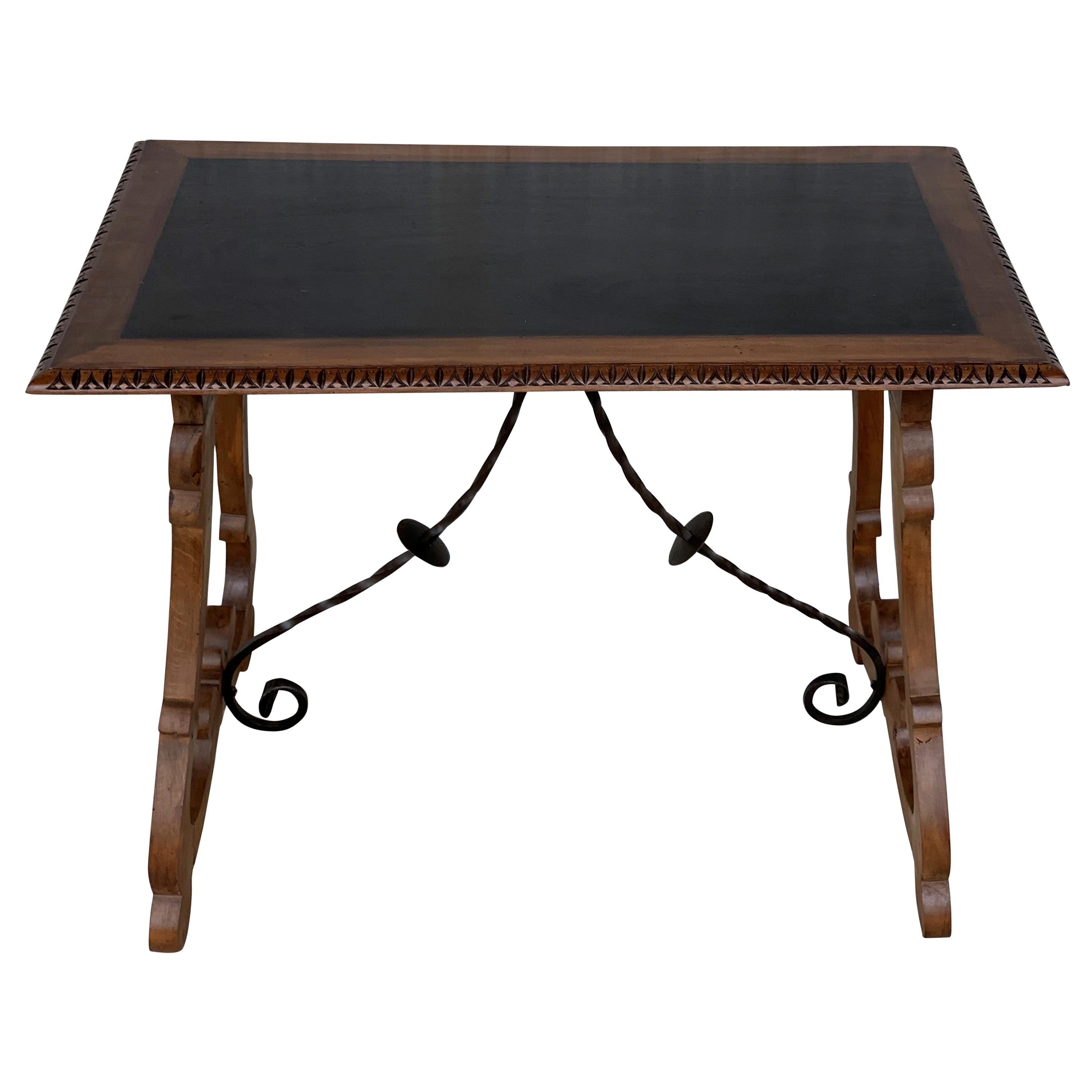 Spanish Farm Table with Iron Stretchers and Hand Carved Top and Ebonized
