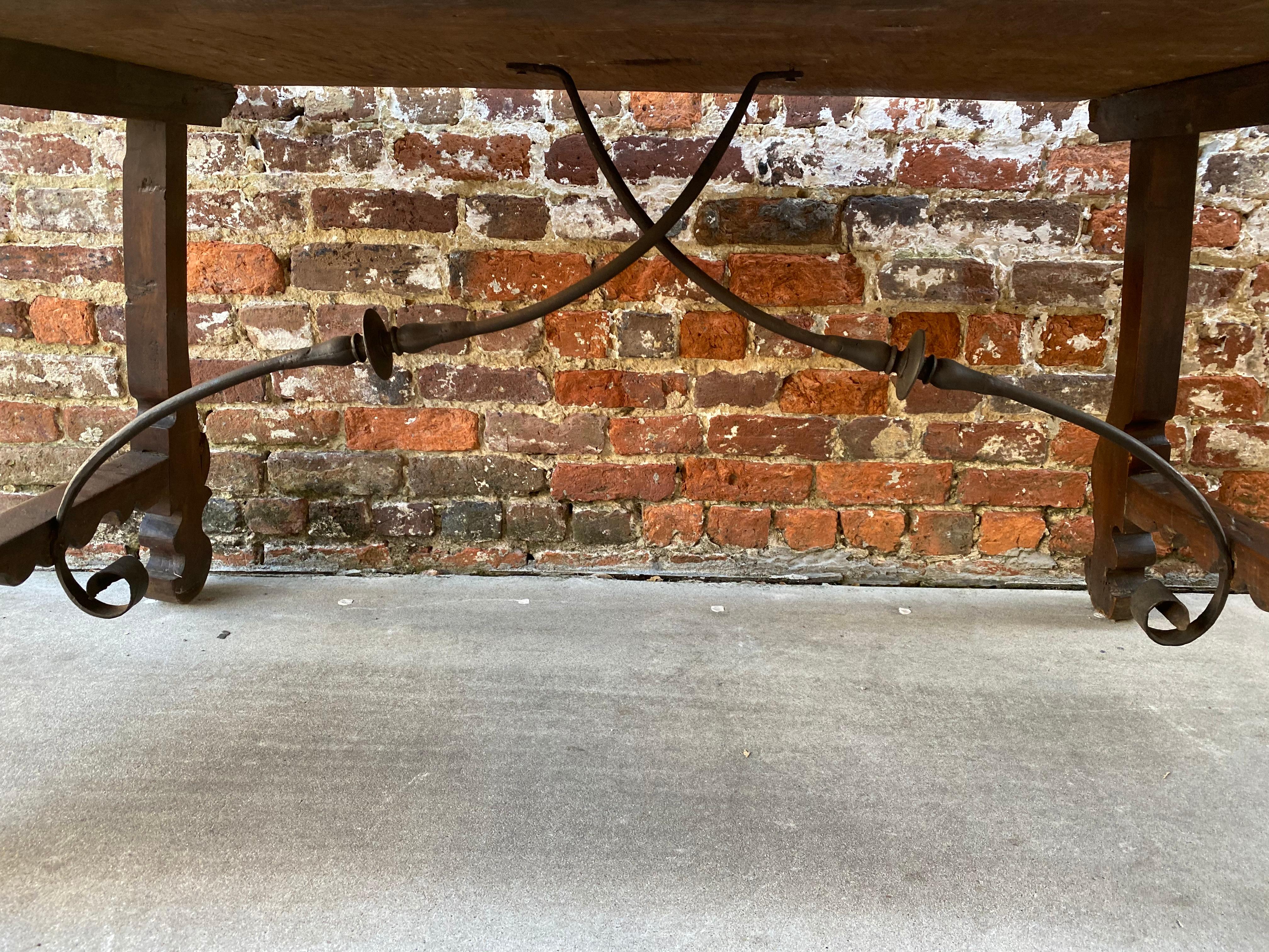 Spanish Farm Table with Trestle Base and Iron Support In Good Condition For Sale In Charleston, SC