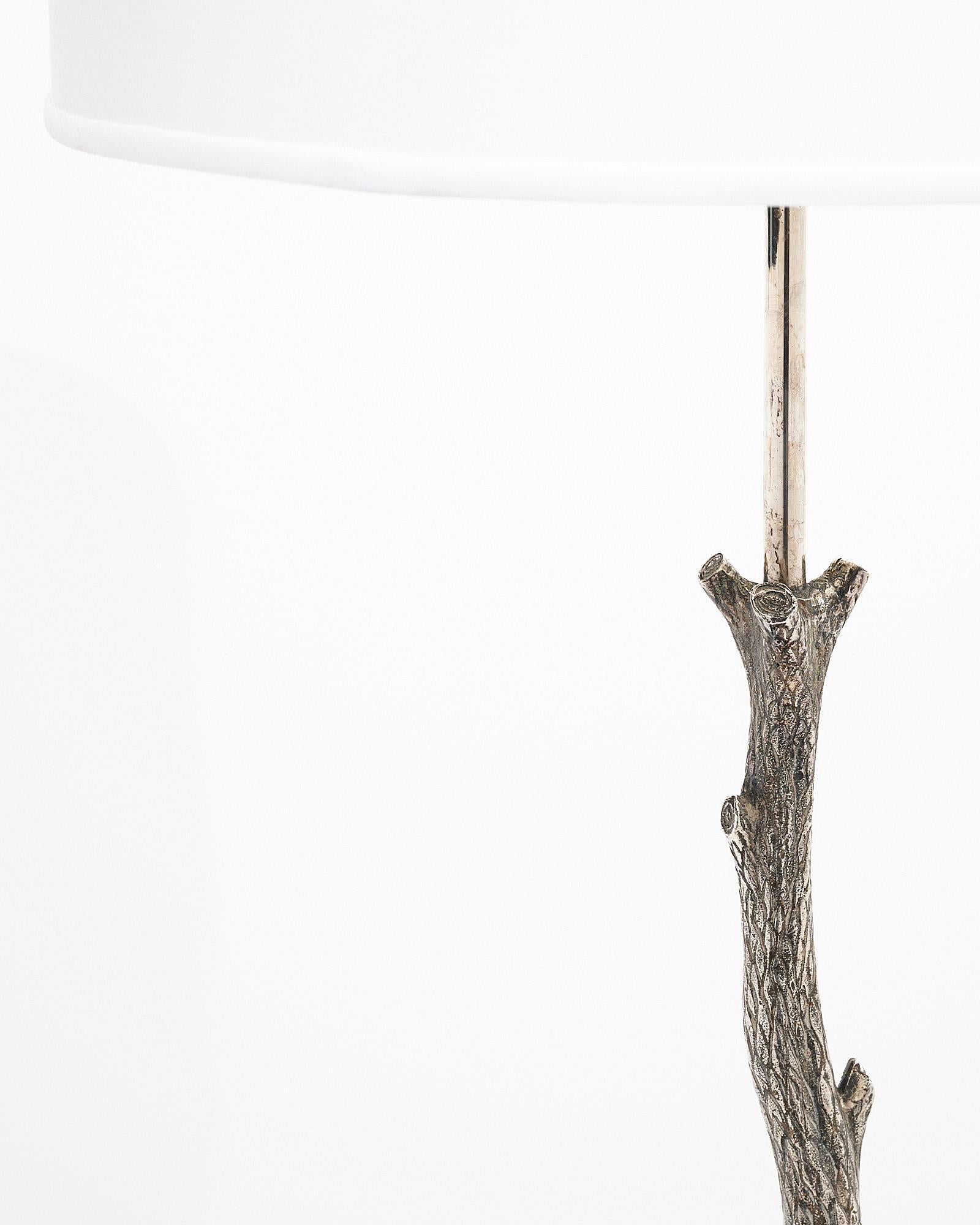 Floor lamp, Spanish, by iconic Barcelona design powerhouse Valenti. It is made of silvered plated bronze. The floor lamp is crafted to replicate a young tree. We love the exquisite details and the original patina. It has been newly wired to fit US