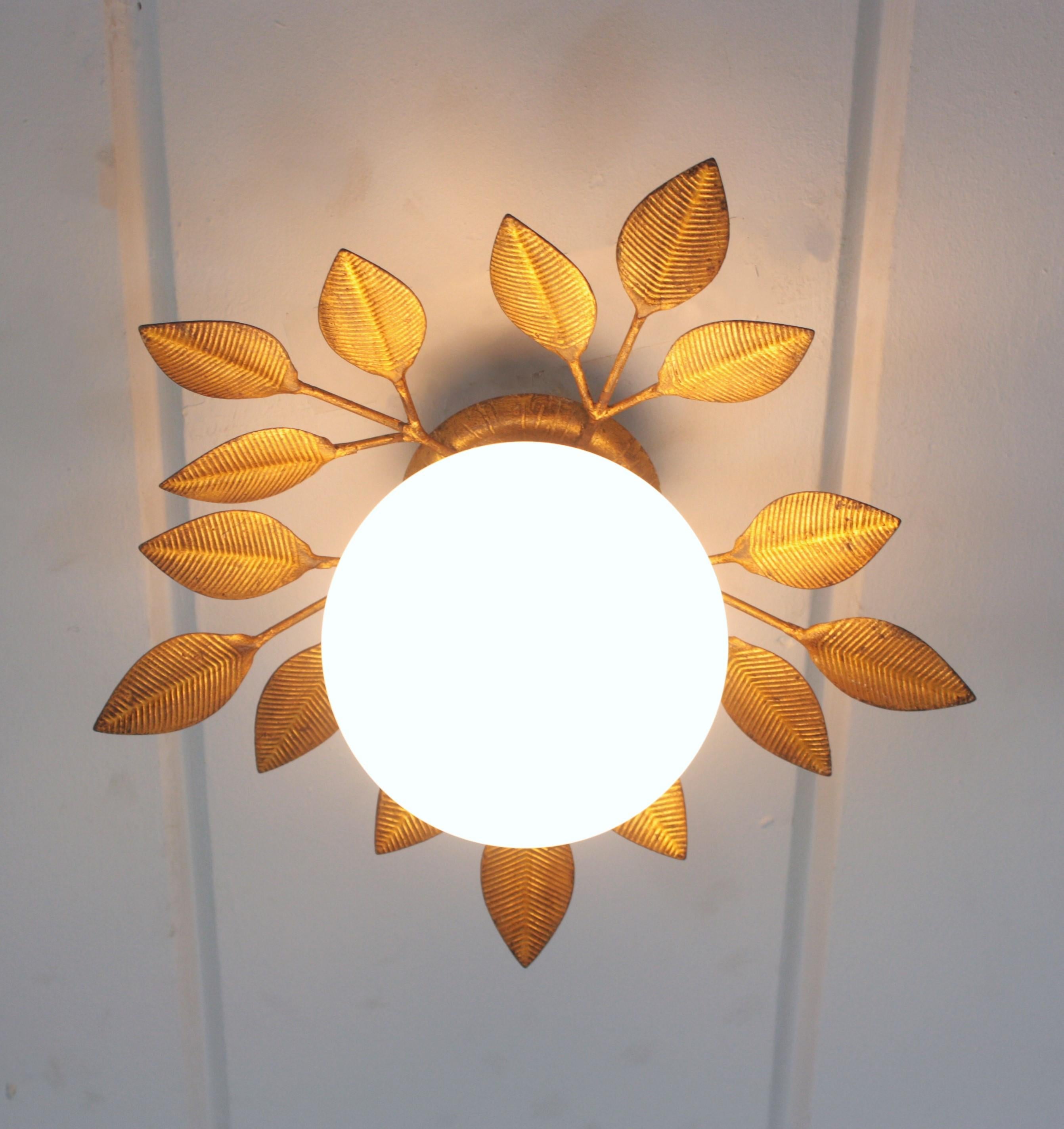 Spanish Foliage Light Fixture in Gilt Iron with Milk Glass Globe, 1950s In Good Condition In Barcelona, ES