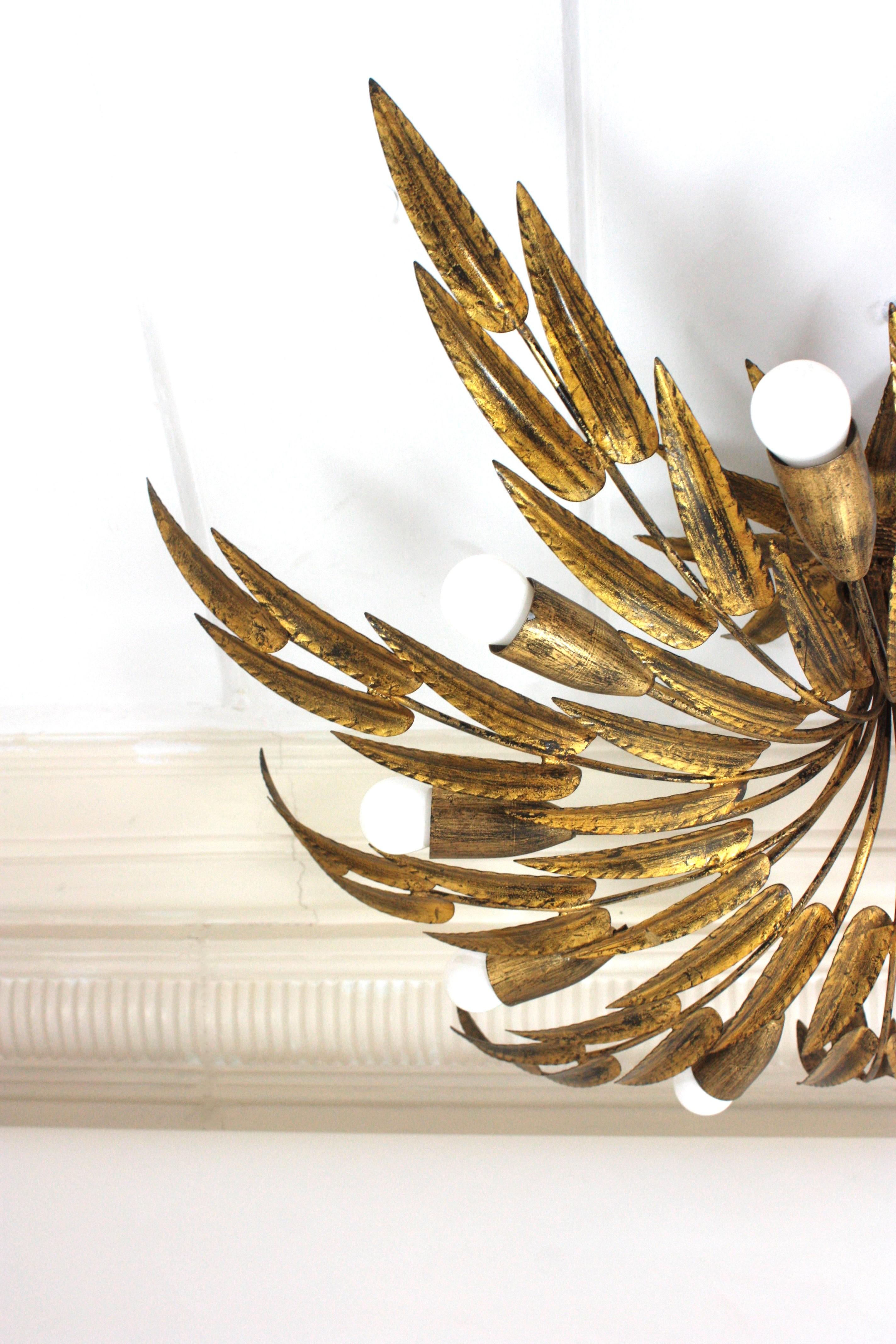 Spanish Foliage Sunburst Light Fixture / Kronleuchter aus vergoldetem Eisen, 10 Lights im Angebot 4