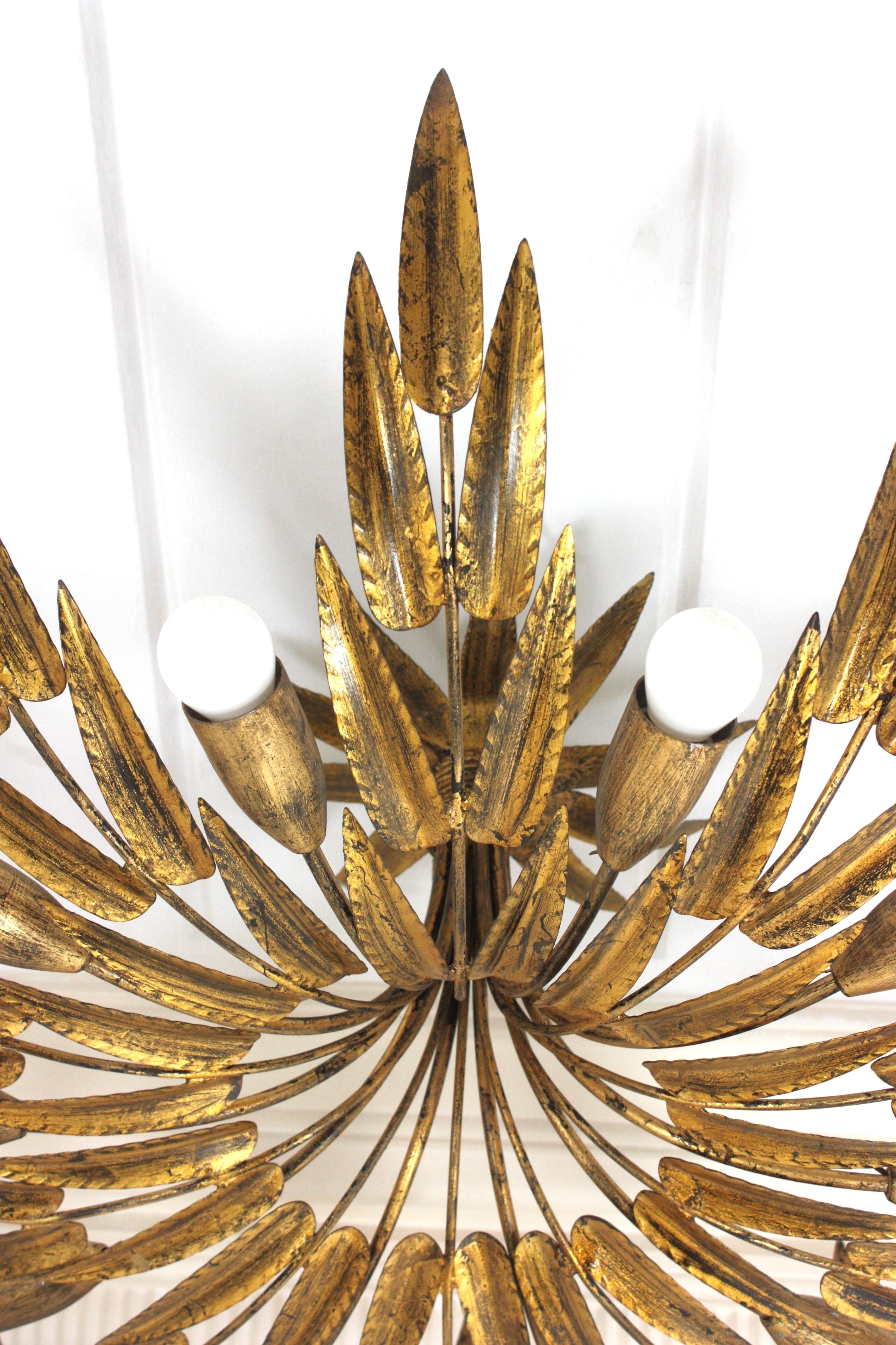 Spanish Foliage Sunburst Light Fixture / Kronleuchter aus vergoldetem Eisen, 10 Lights im Angebot 6
