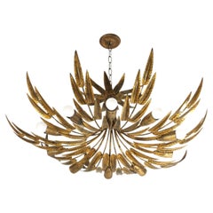 Lampadario a raggiera con fogliame spagnolo in ferro dorato, 10 luci