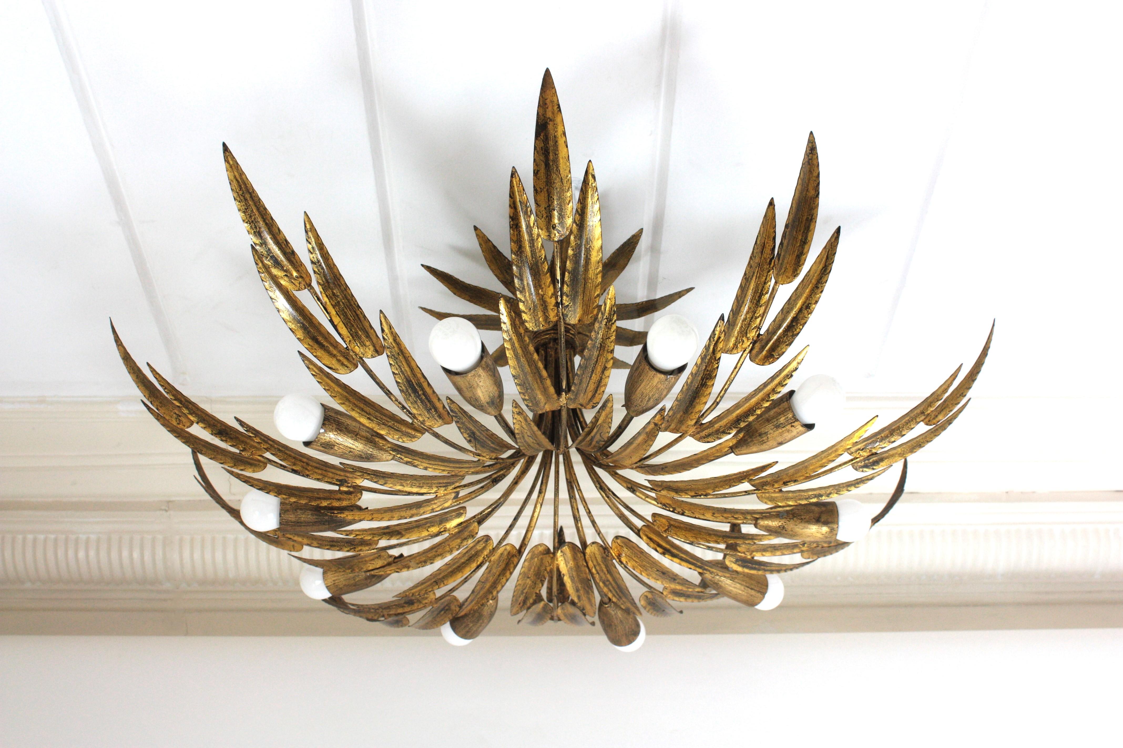 Spanish Foliage Sunburst Light Fixture / Kronleuchter aus vergoldetem Eisen, 10 Lights (Vergoldet) im Angebot