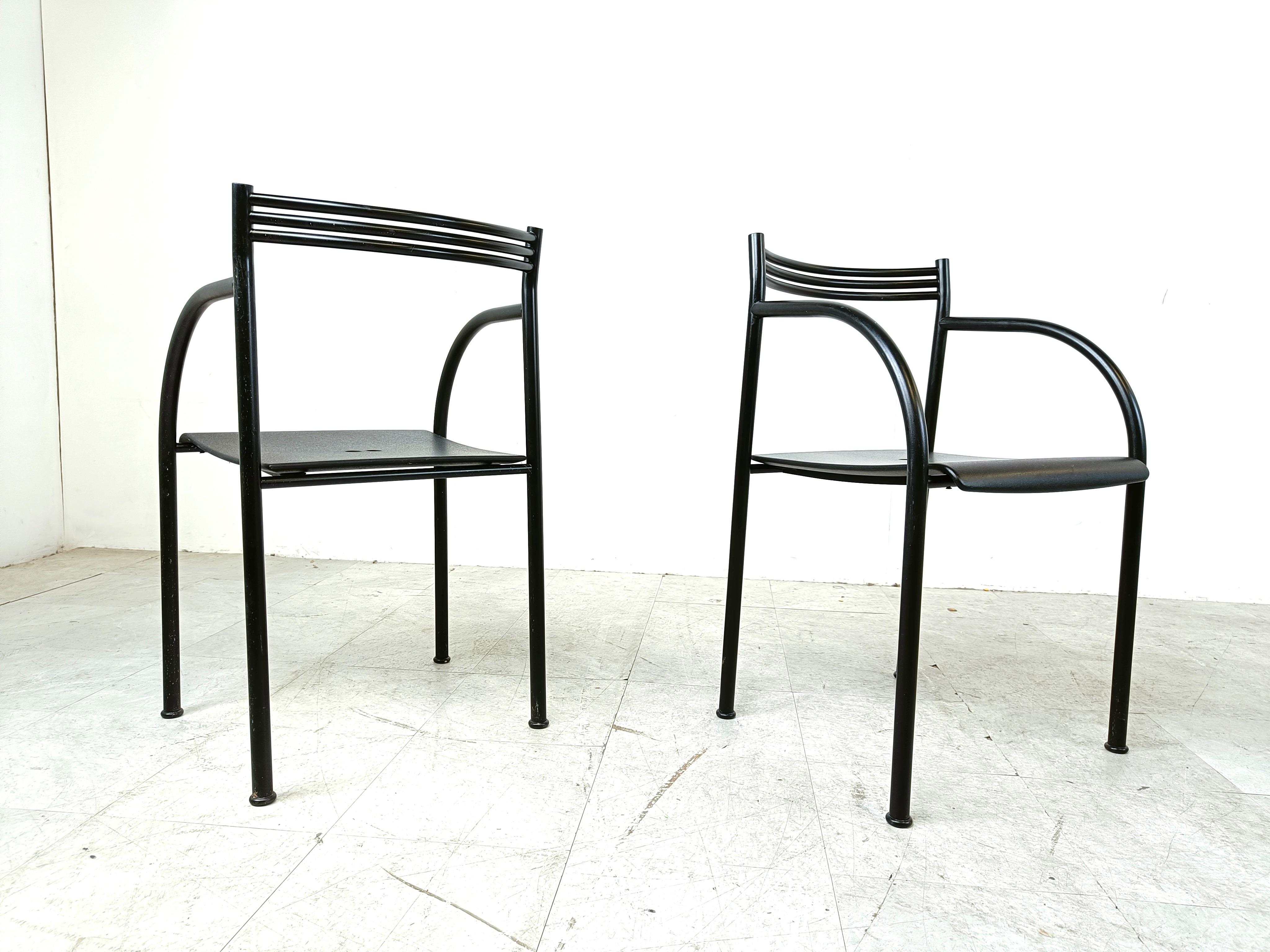 Set of 4 very rare 'Spanish Francesca' armchairs designed by Philippe Starck for Baleri Italia.

They were designed in 1982.

Nice ppost modern design.

Frames made out of black metal with a thin sheat of metal for a seat.

Can be used