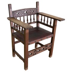 Fauteuil Spanish Friar en bois et cuir gaufré de couleur noire