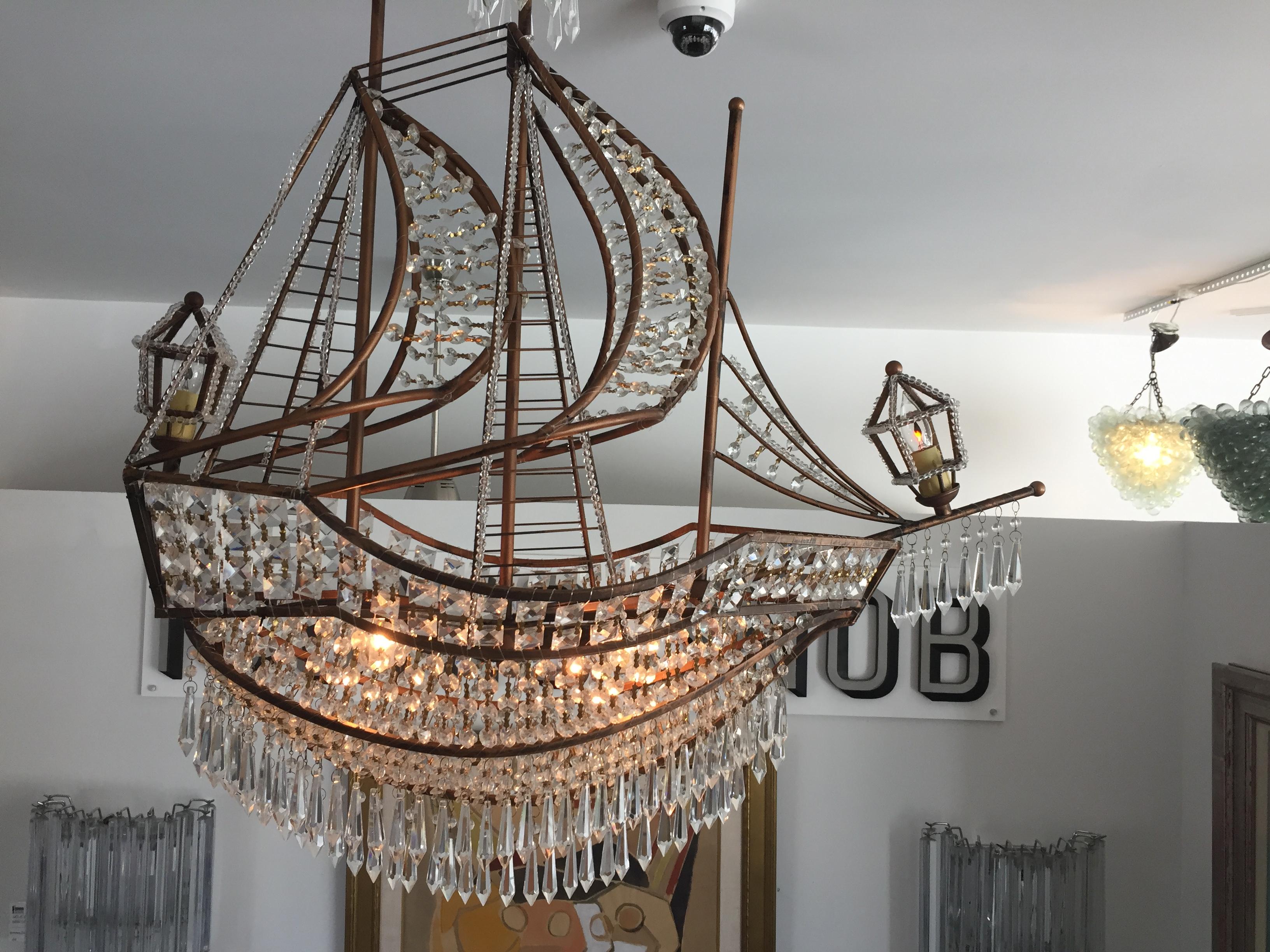 This stylish Maison Bagues inspired chandelier was acquired from a Palm Beach estate and will add a bit of whimsy and Hollywood Regency magic to your home.

Overall dimensions:  59.50