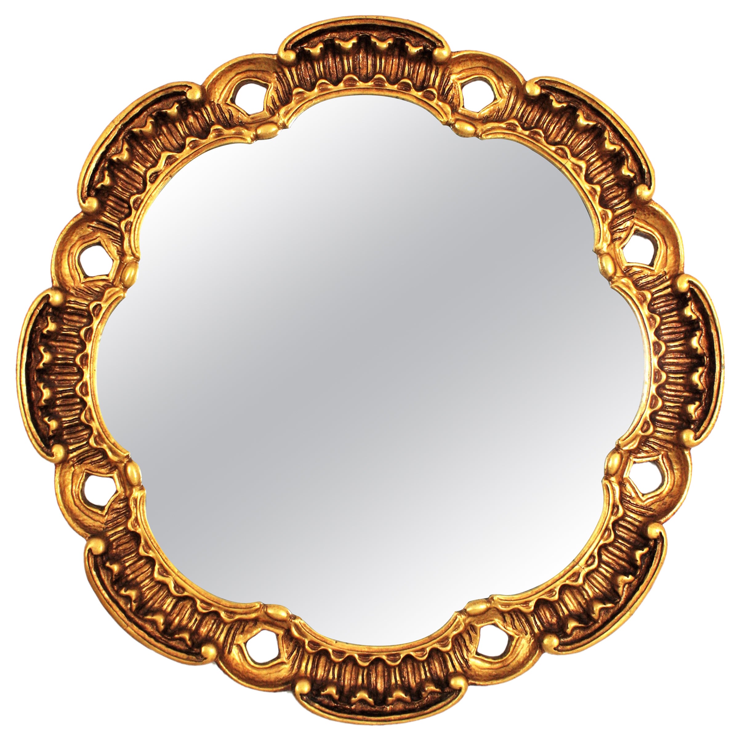 Miroir rond espagnol sculpté et doré par Francisco Hurtado en vente