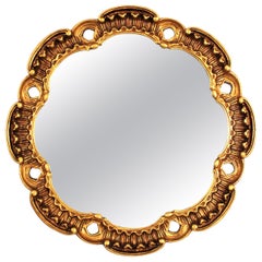 Specchio rotondo in legno dorato spagnolo intagliato di Francisco Hurtado