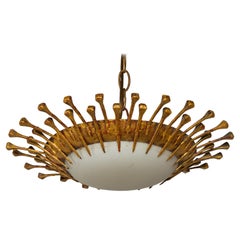 Spanish Gilt Metal Sunburst Light Fixture with Opaque Glass and Single Light