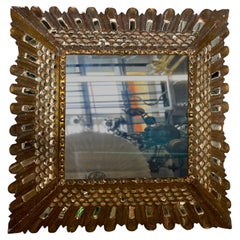 Miroir espagnol en bois doré
