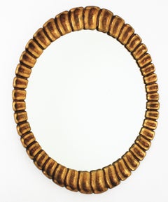 Sunburst Giltwood Oval Mirror by Francisco Hurtado, 1950s