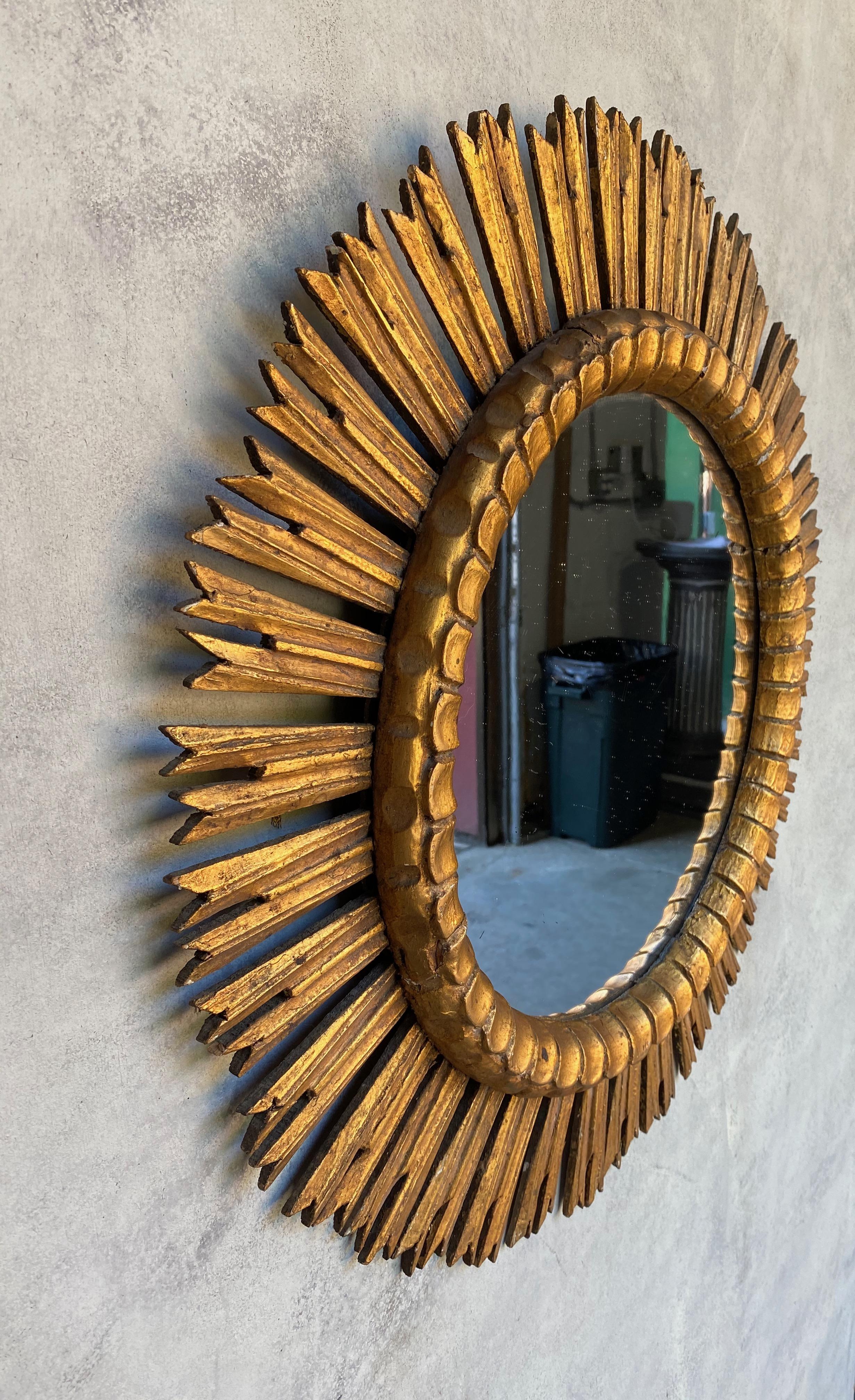 Wood Spanish Giltwood Sunburst Mirror with Carved Frame