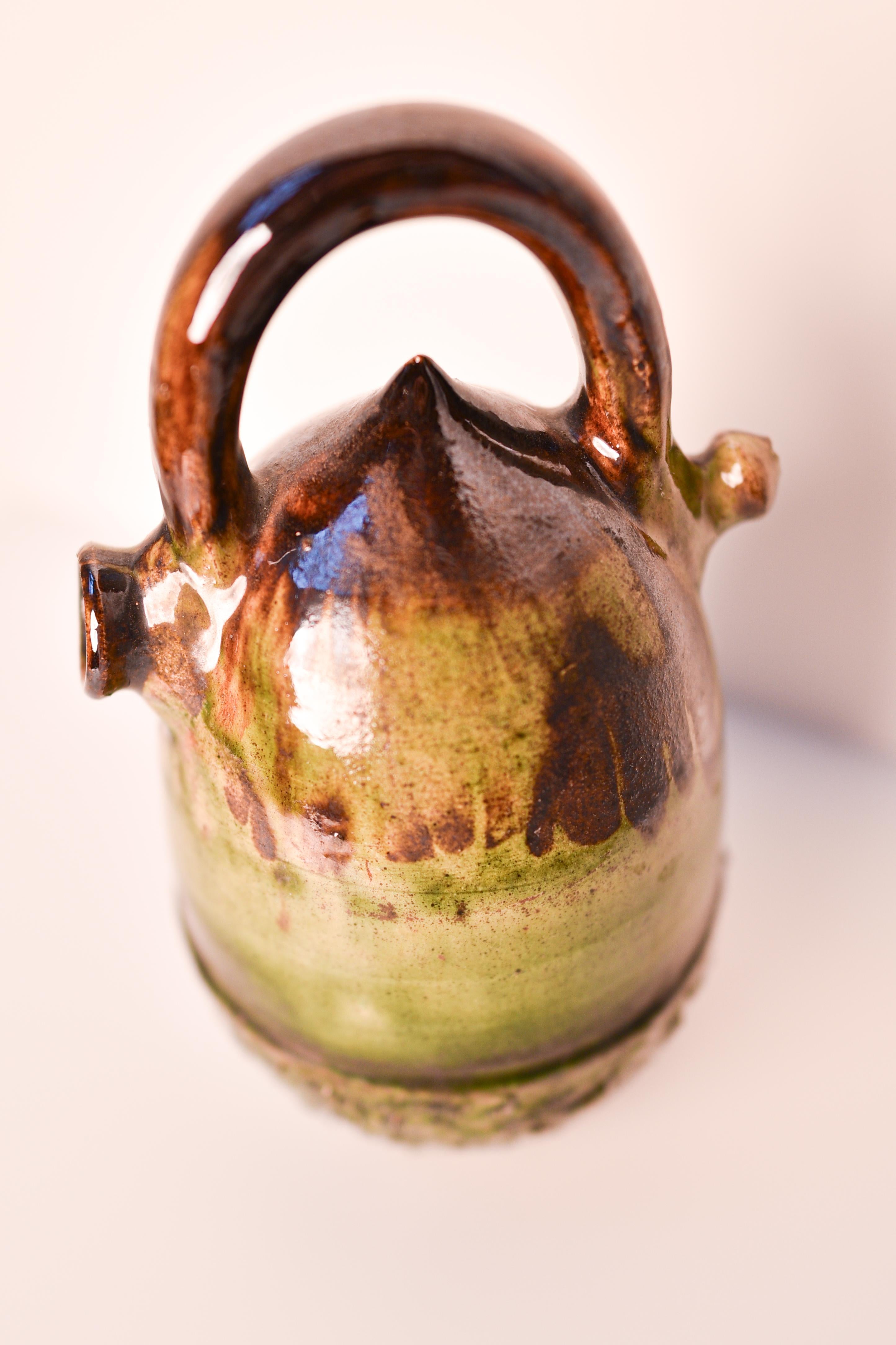 Terracotta Spanish glazed terracotta botijo/ búcaro or water jar in the shape of an acorn For Sale