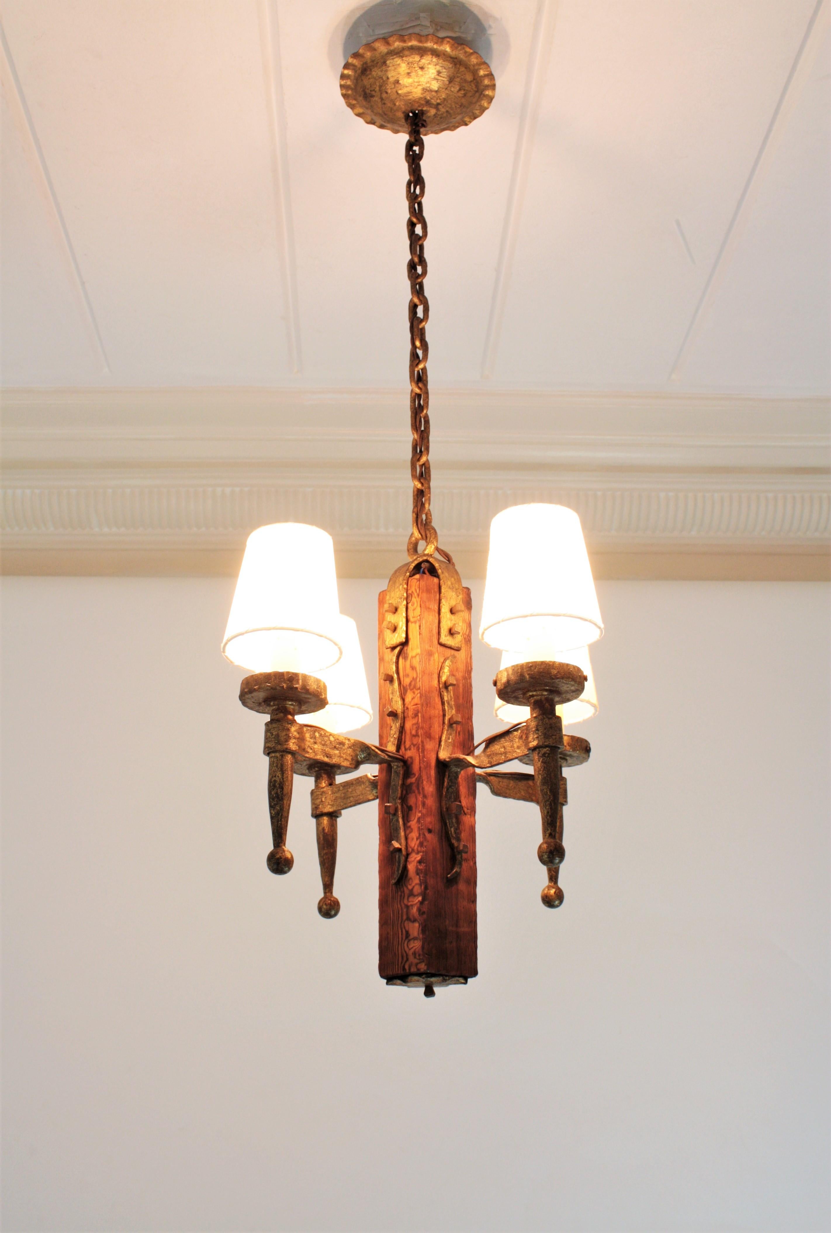 Spanish Gothic Style Chandelier in Gilt Wrought Iron and Wood with Nail Details 5