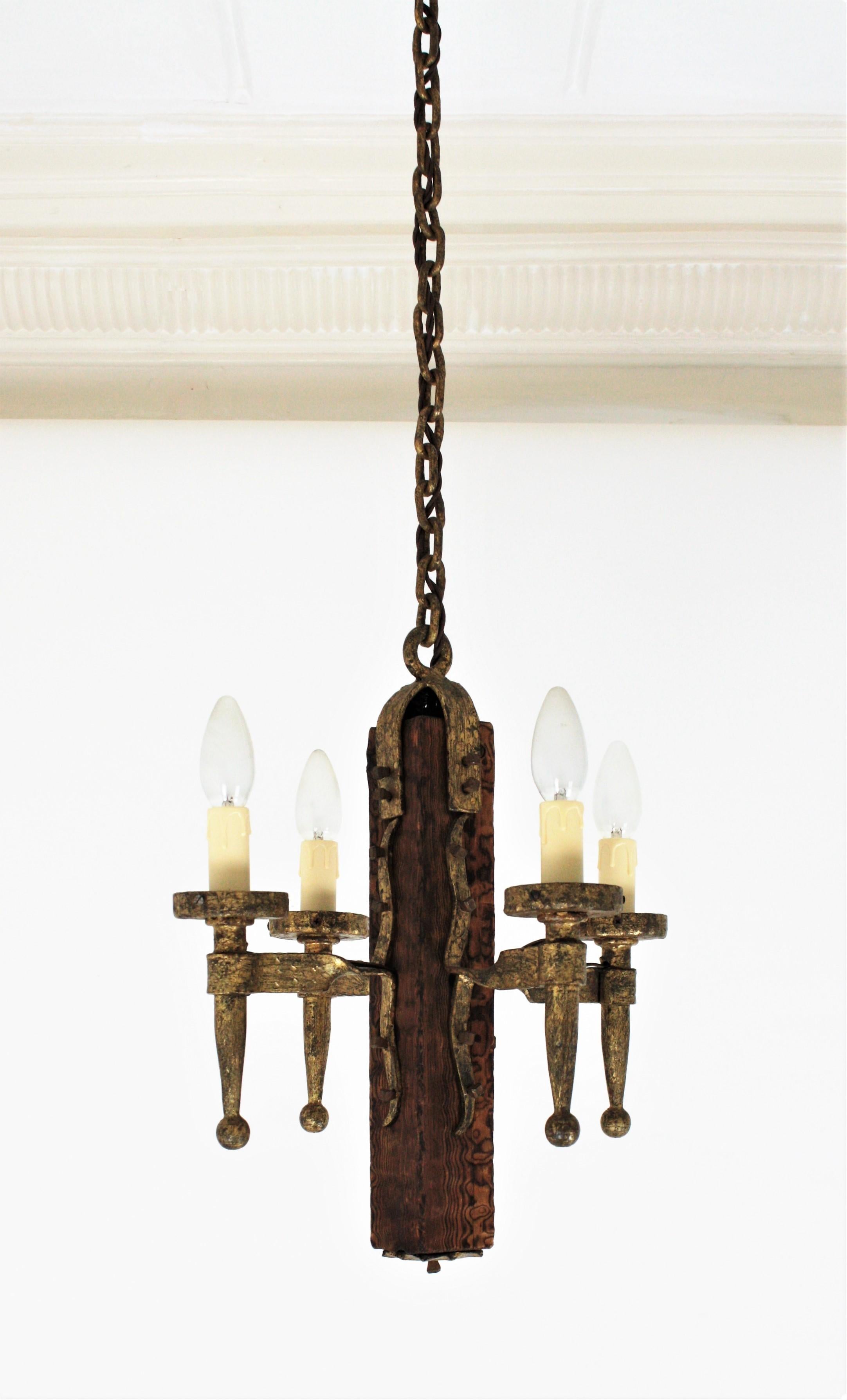 Spanish Gothic Style Chandelier in Gilt Wrought Iron and Wood with Nail Details 7