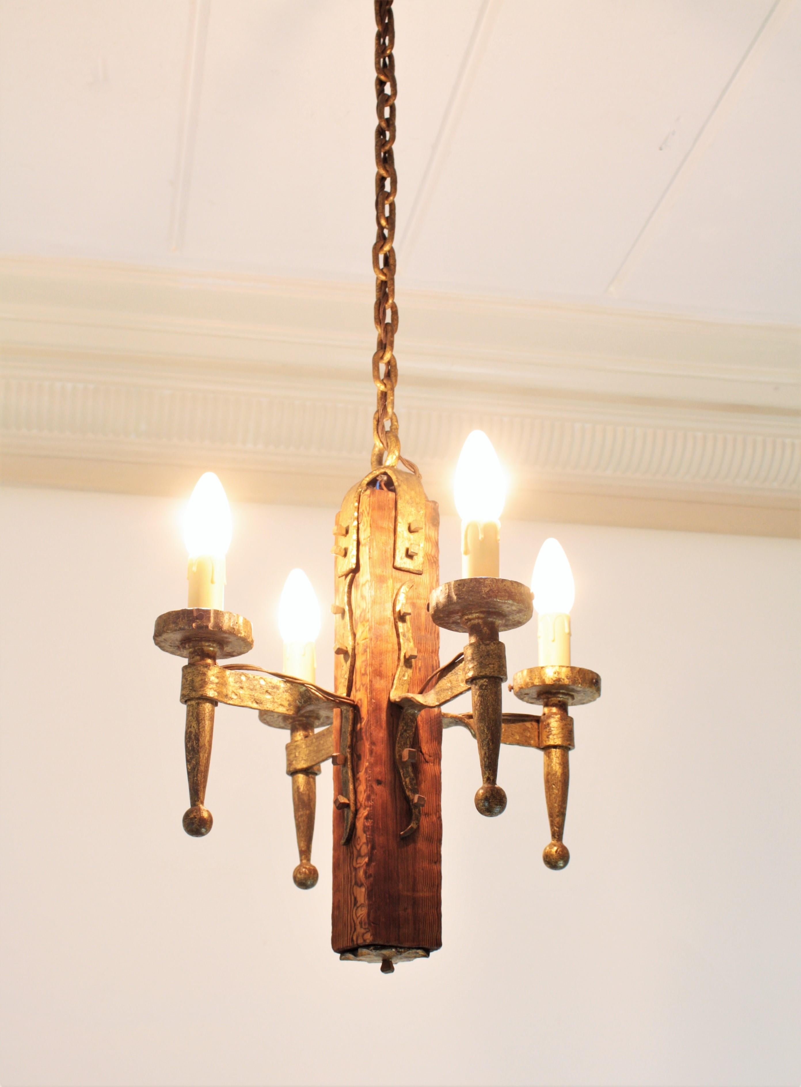 Spanish Gothic Style Chandelier in Gilt Wrought Iron and Wood with Nail Details 8