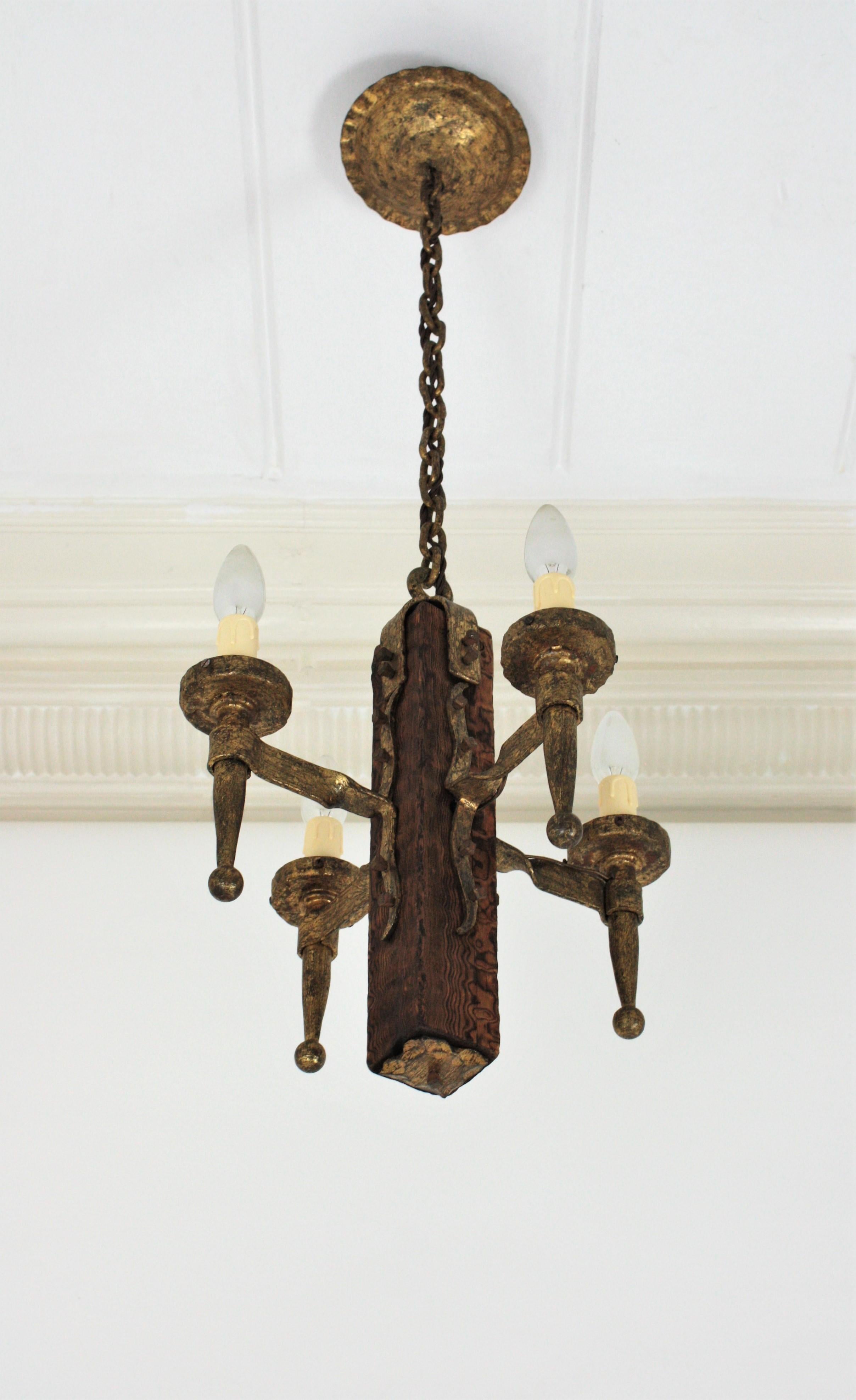 Spanish Gothic Style Chandelier in Gilt Wrought Iron and Wood with Nail Details 9