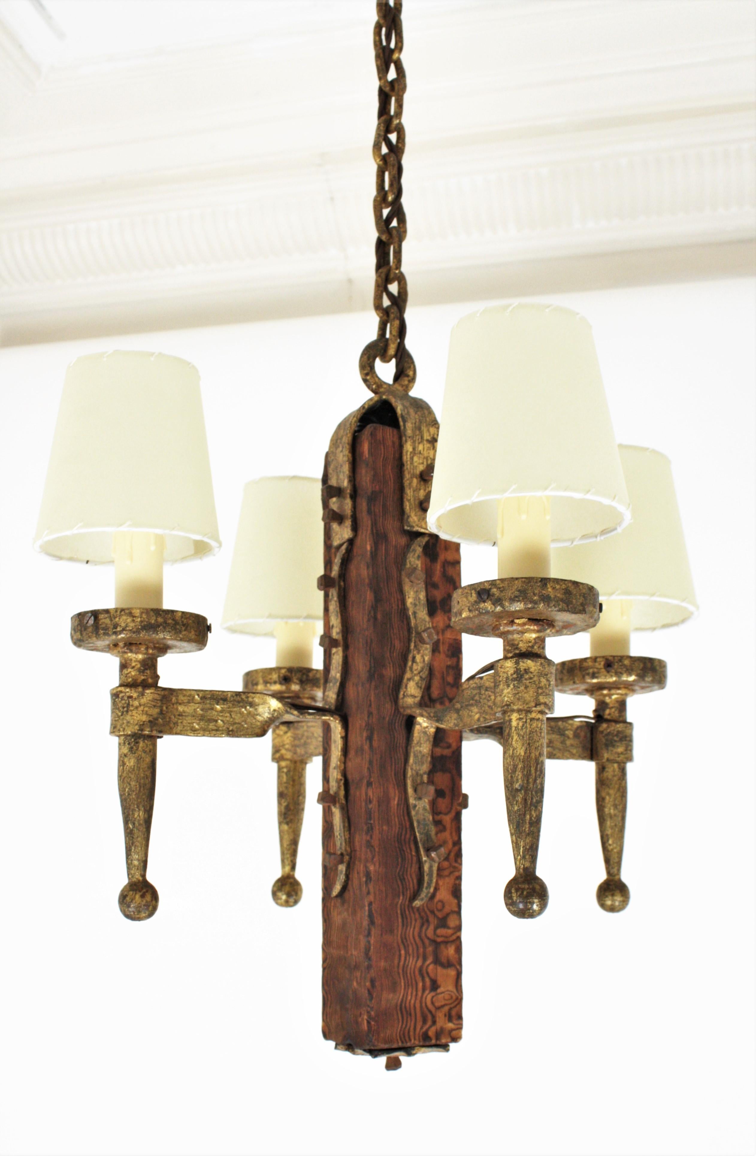 Spanish Gothic Style Chandelier in Gilt Wrought Iron and Wood with Nail Details 11