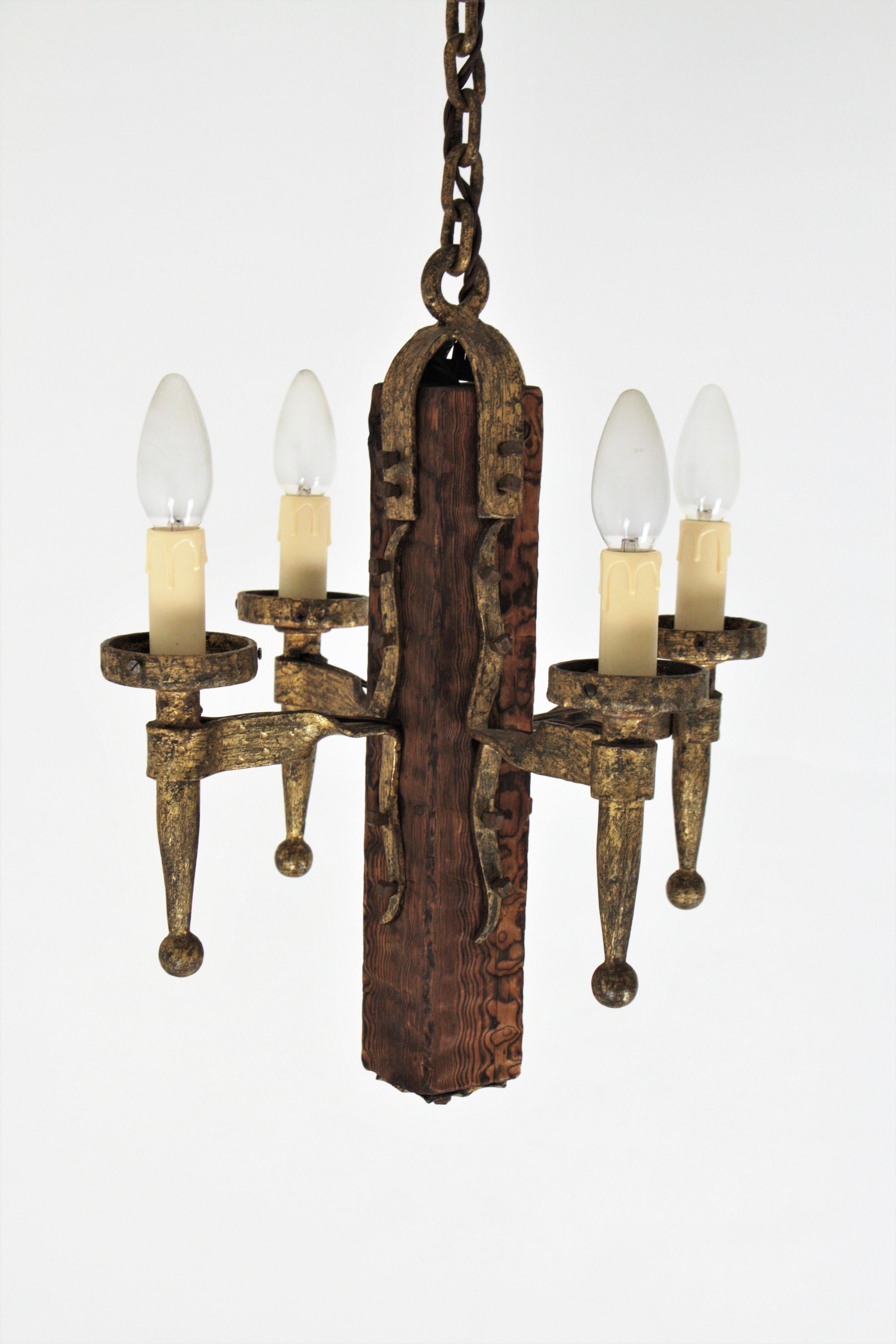 Spanish Gothic Style Chandelier in Gilt Wrought Iron and Wood with Nail Details 12