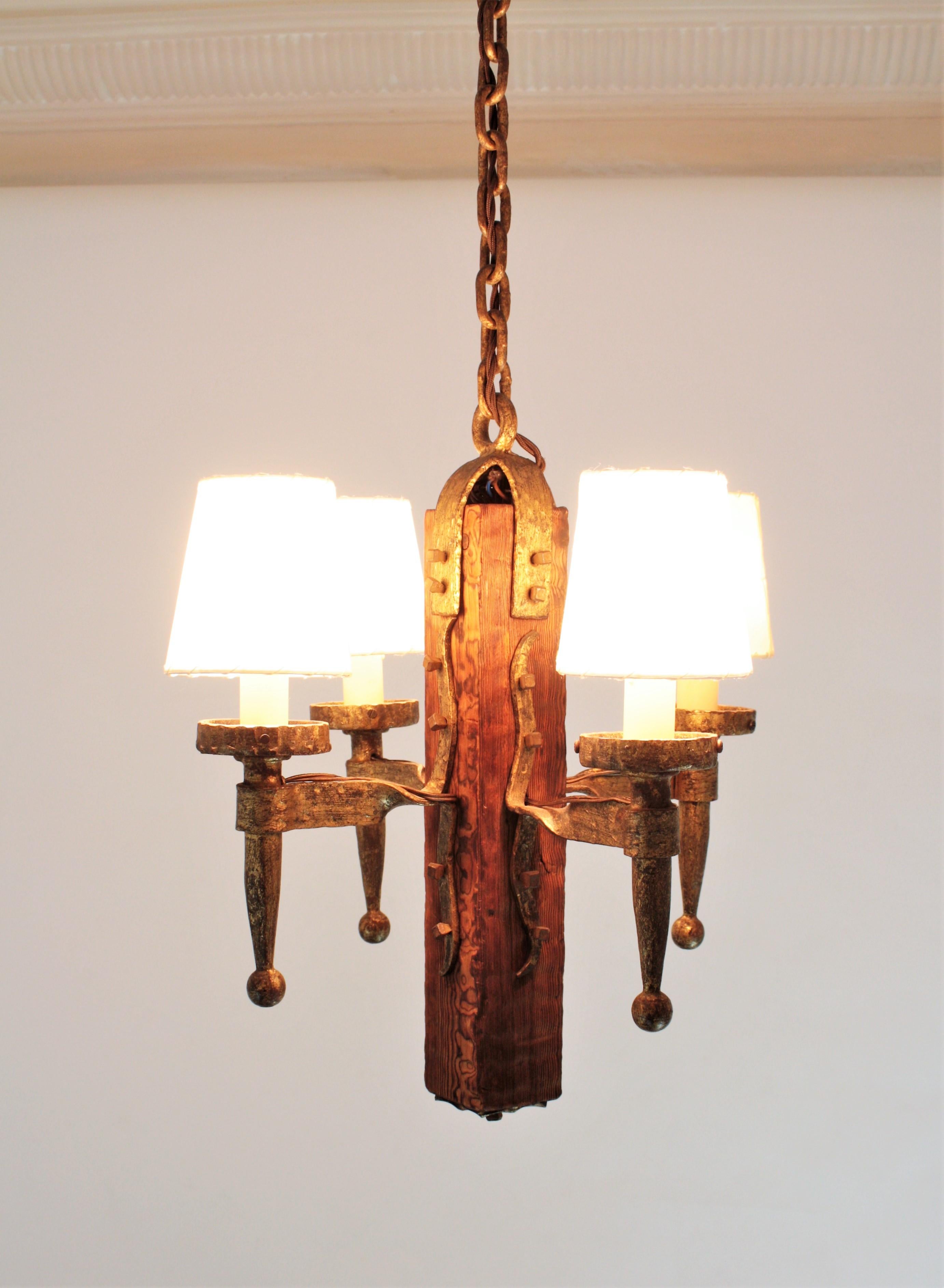Spanish Gothic Style Chandelier in Gilt Wrought Iron and Wood with Nail Details 14