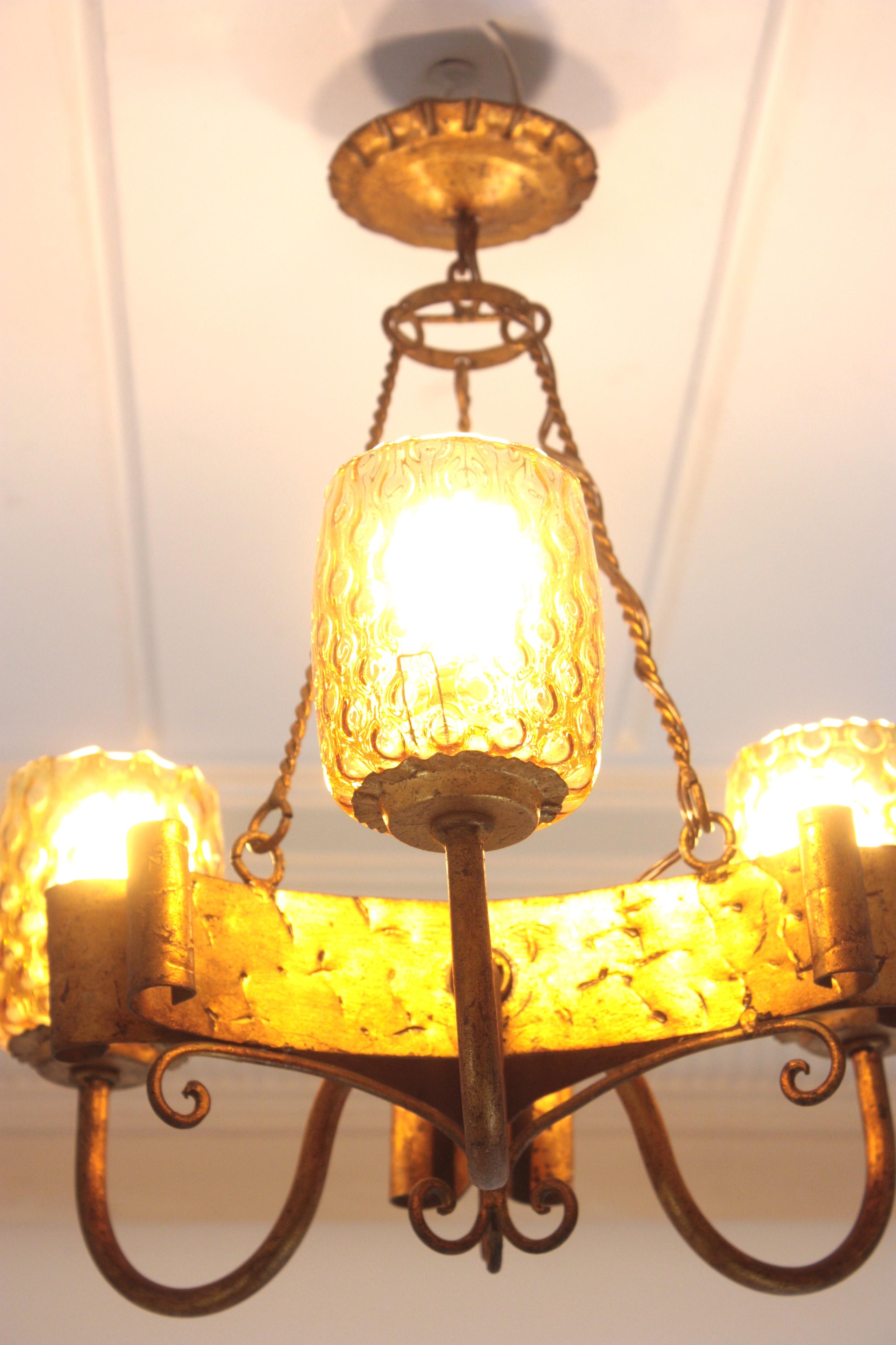 Spanish Gothic Style Chandelier with Amber Glass Shades, Gilt Wrought Iron For Sale 4