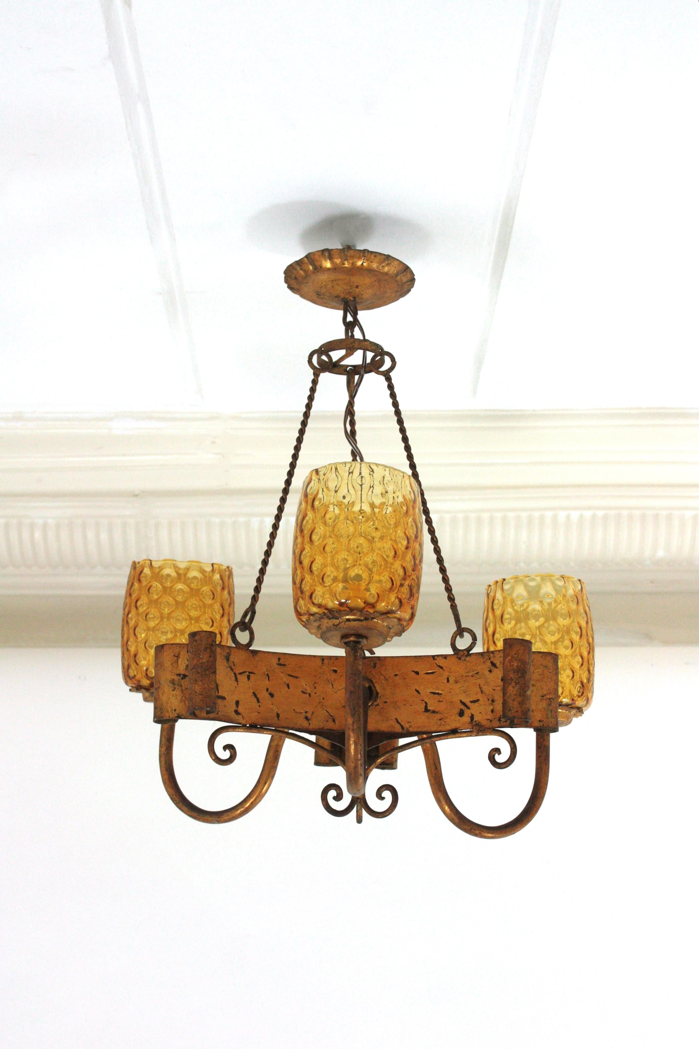 Spanish Gothic Style Chandelier with Amber Glass Shades, Gilt Wrought Iron For Sale 11
