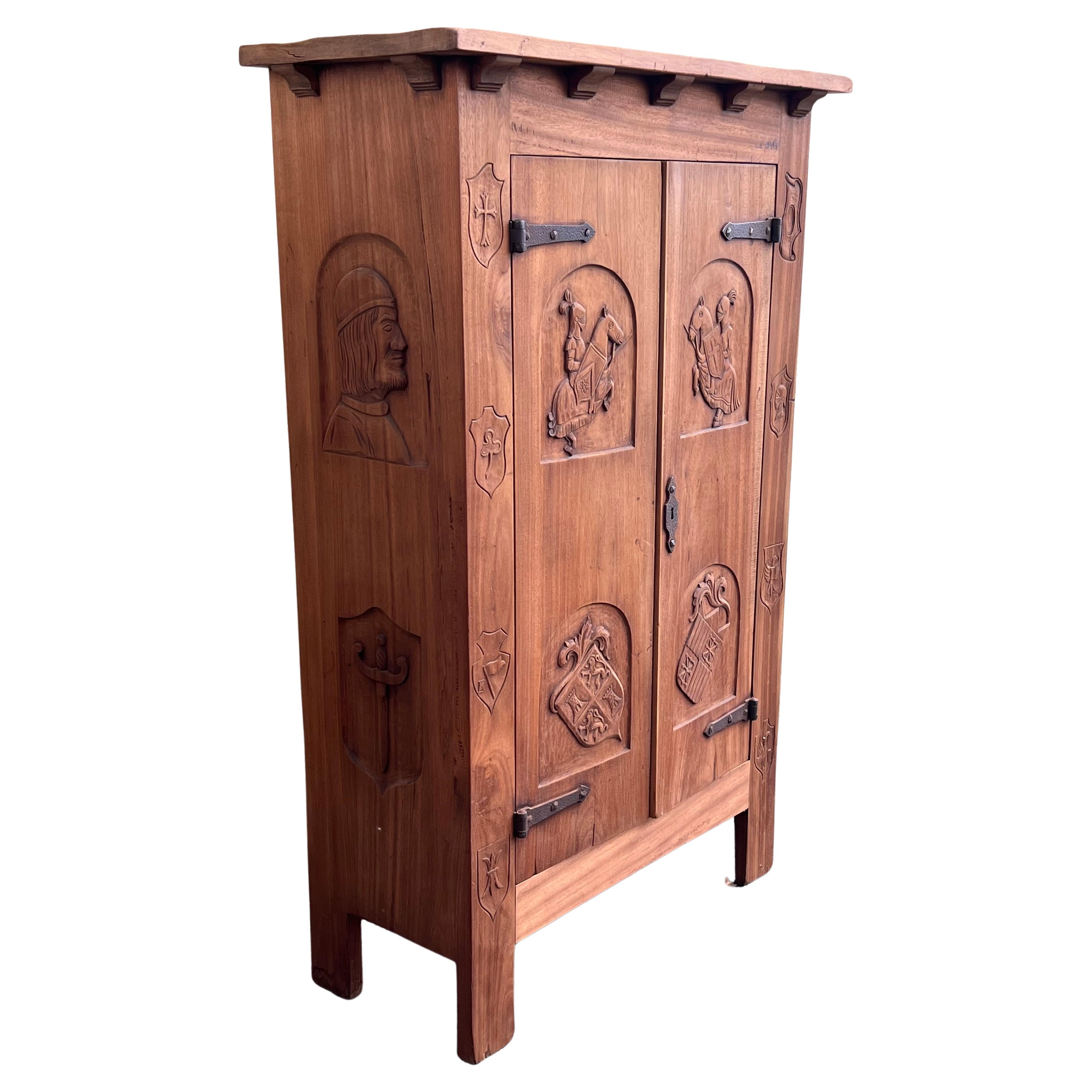 Spanish Gothic Style Walnut Entry Wardrobe with Five hangers and carvings For Sale