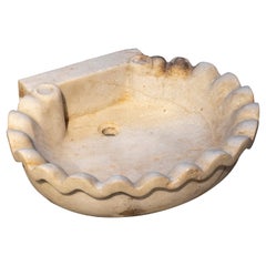 Lavabo spagnolo in marmo intagliato a mano con forma di conchiglia