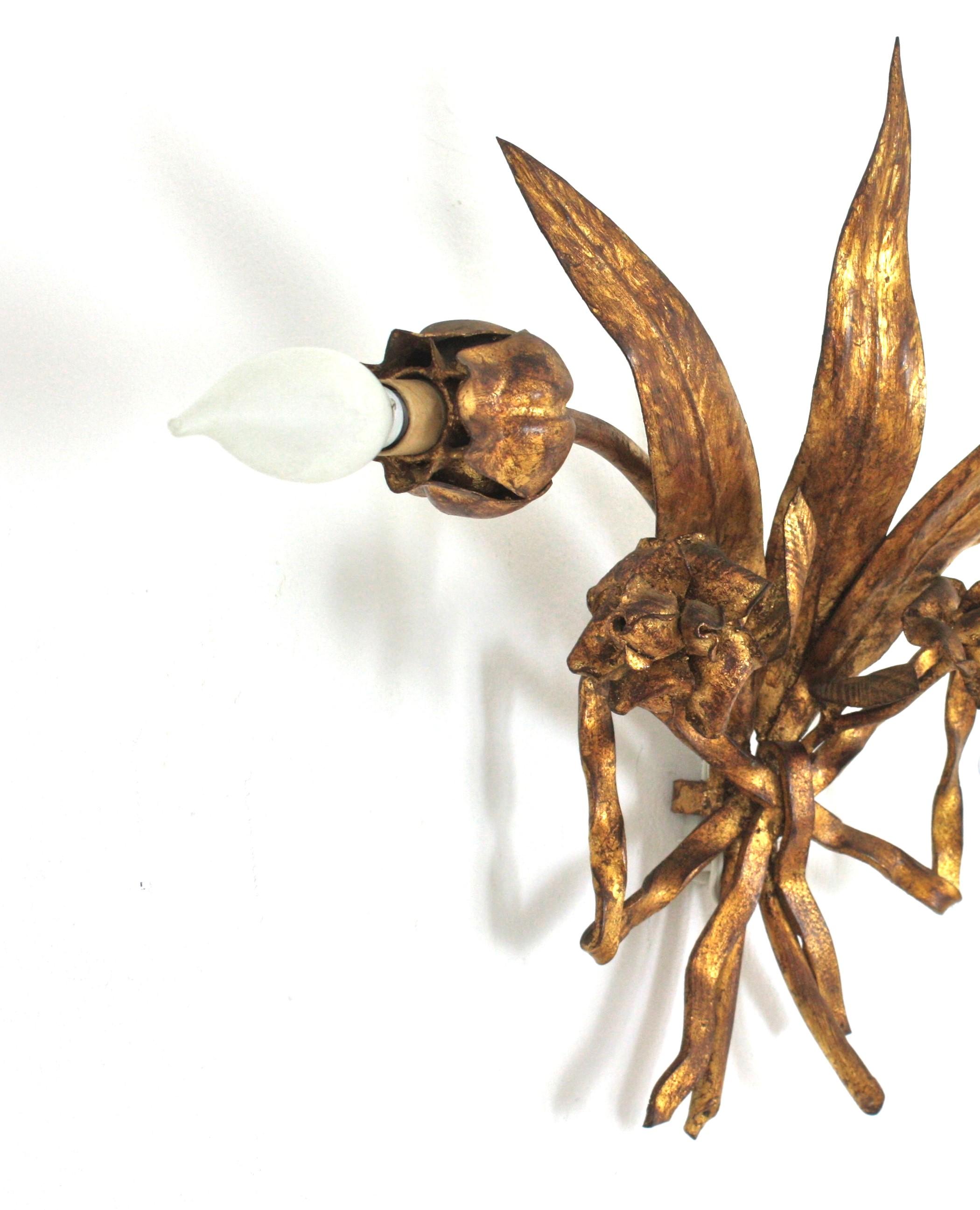 Hollywood Regency Spanish Hand Forged Flower Bouquet Two-Light Wall Sconce in Gilt Iron For Sale