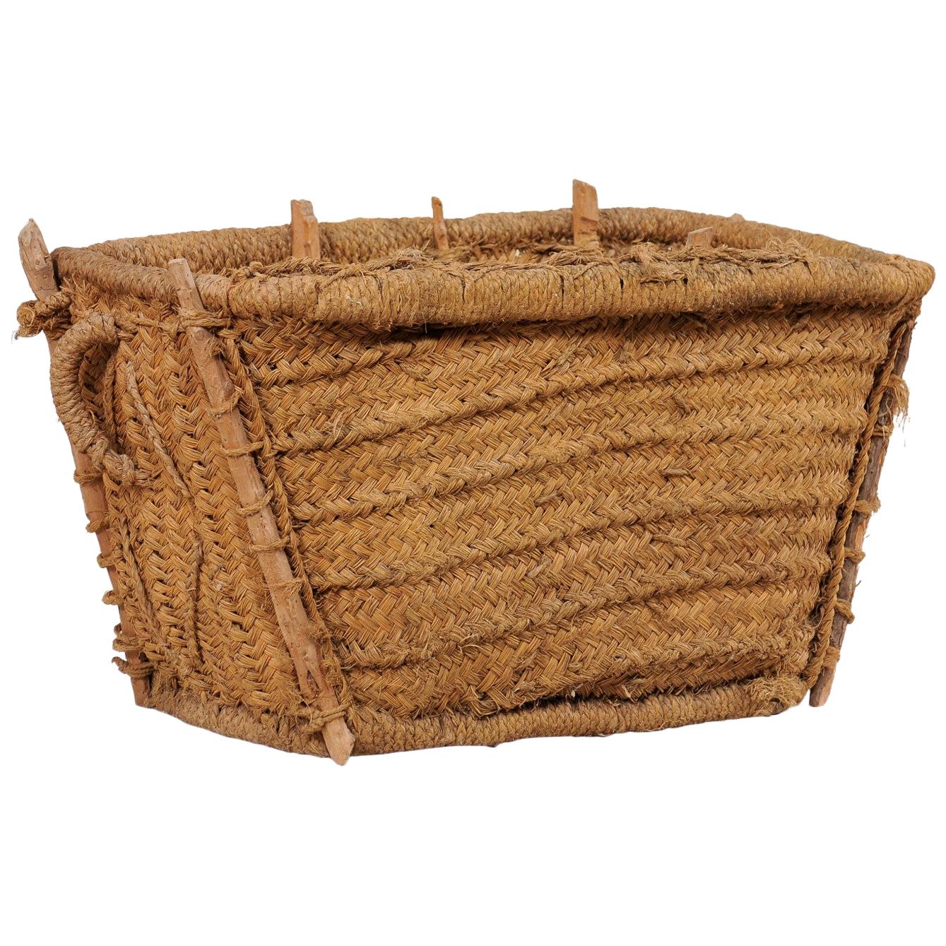Spanish Handwoven Basket with Lid, Trapezoidal Shaped Body and Natural Fibers For Sale