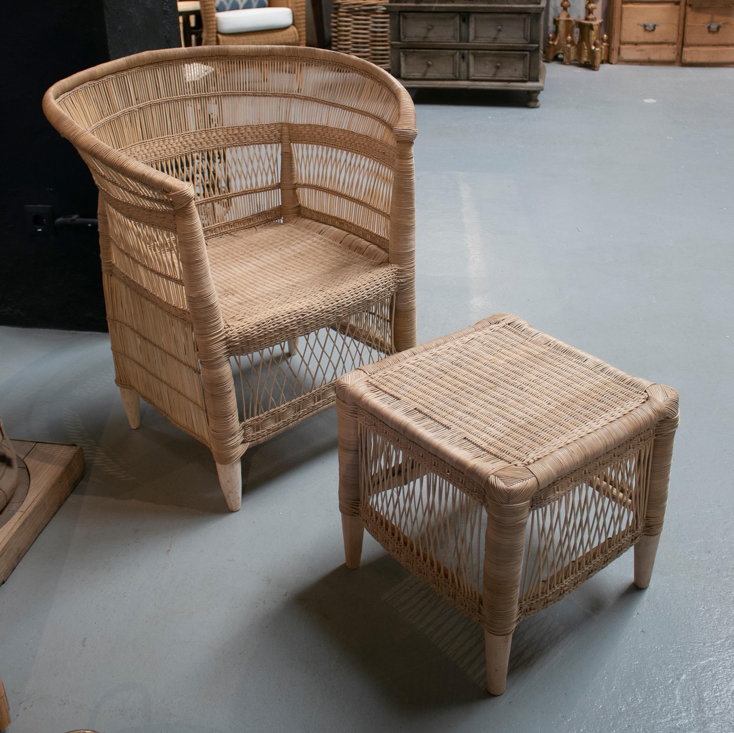 Spanish hand wove rattan armchair and low puff stool. 

Measures: Puff 40 x 40 x 40cm.