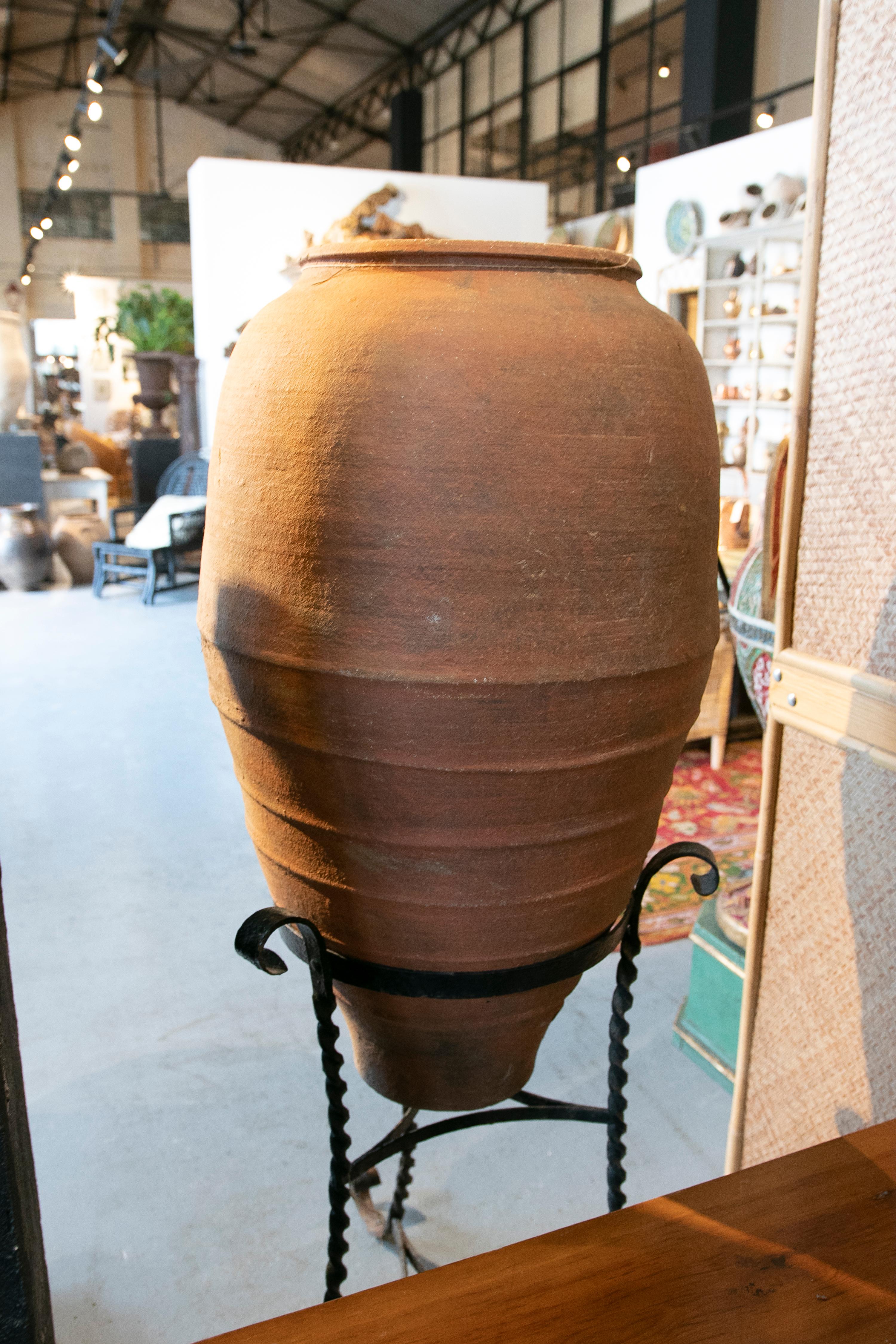 Spanish Handmade Ceramic Jar with Iron Base For Sale 7