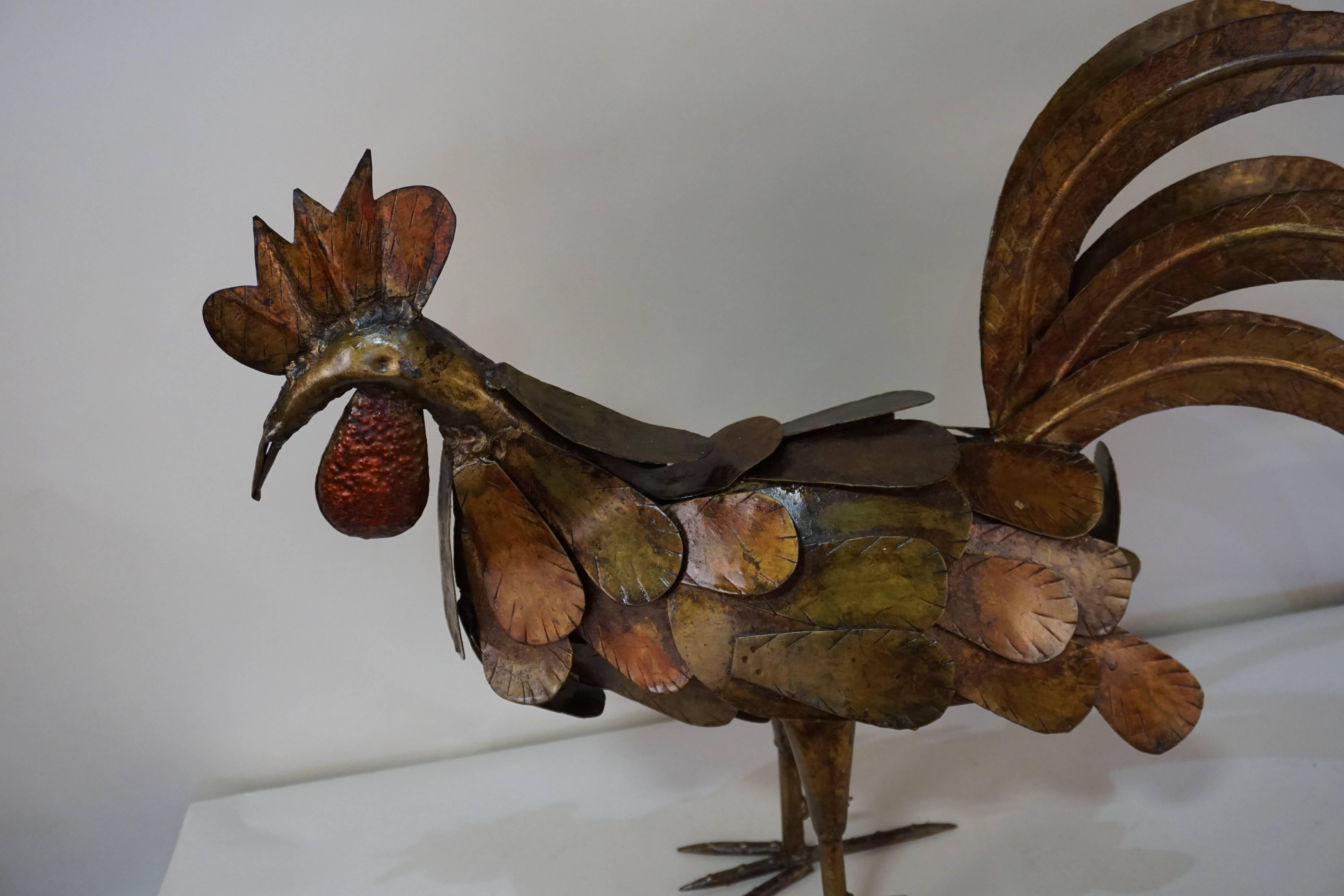 Crafted in Spain during 1950s. A handmade iron gold leaf and rooster sculpture.