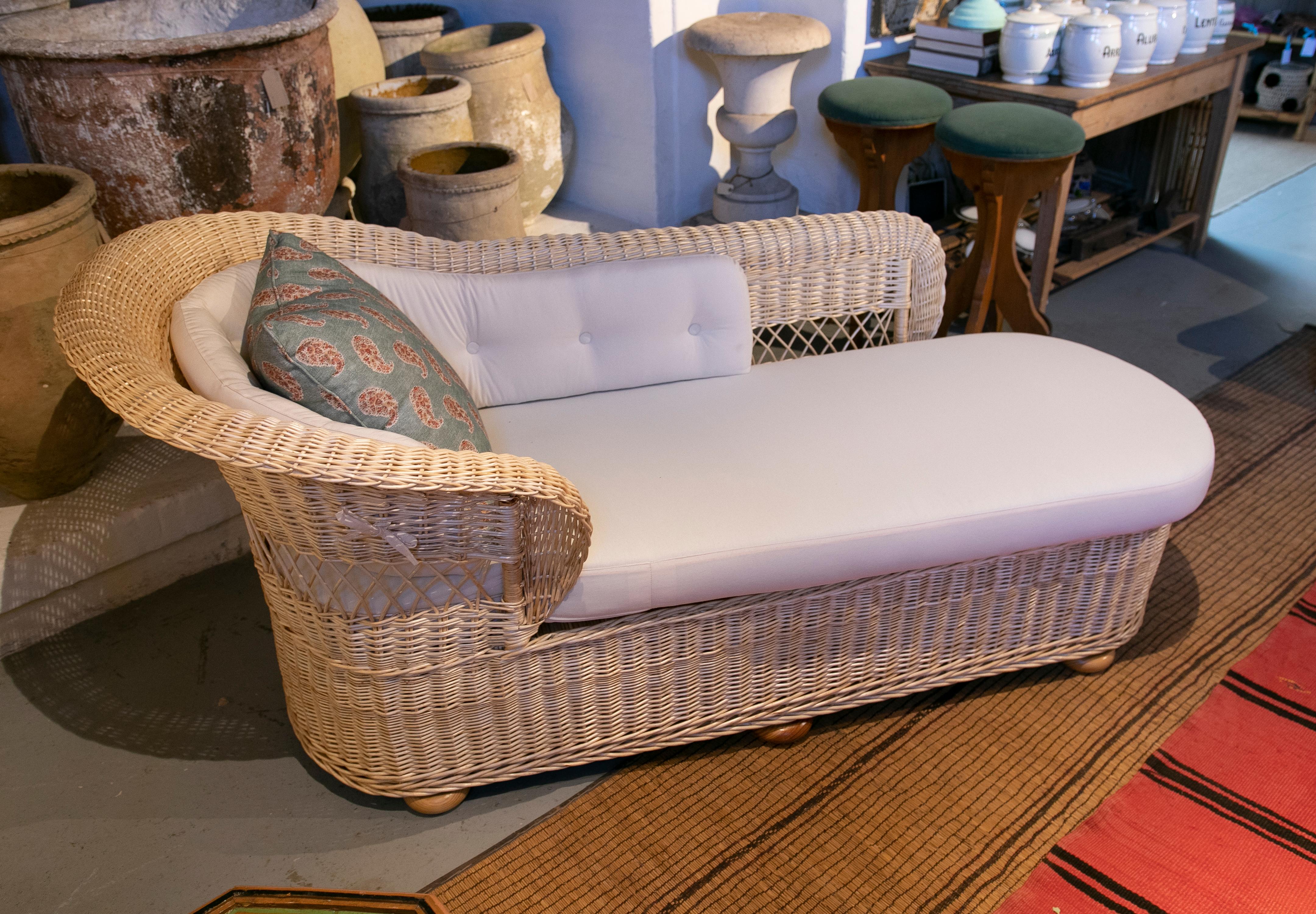 white wicker chaise lounge