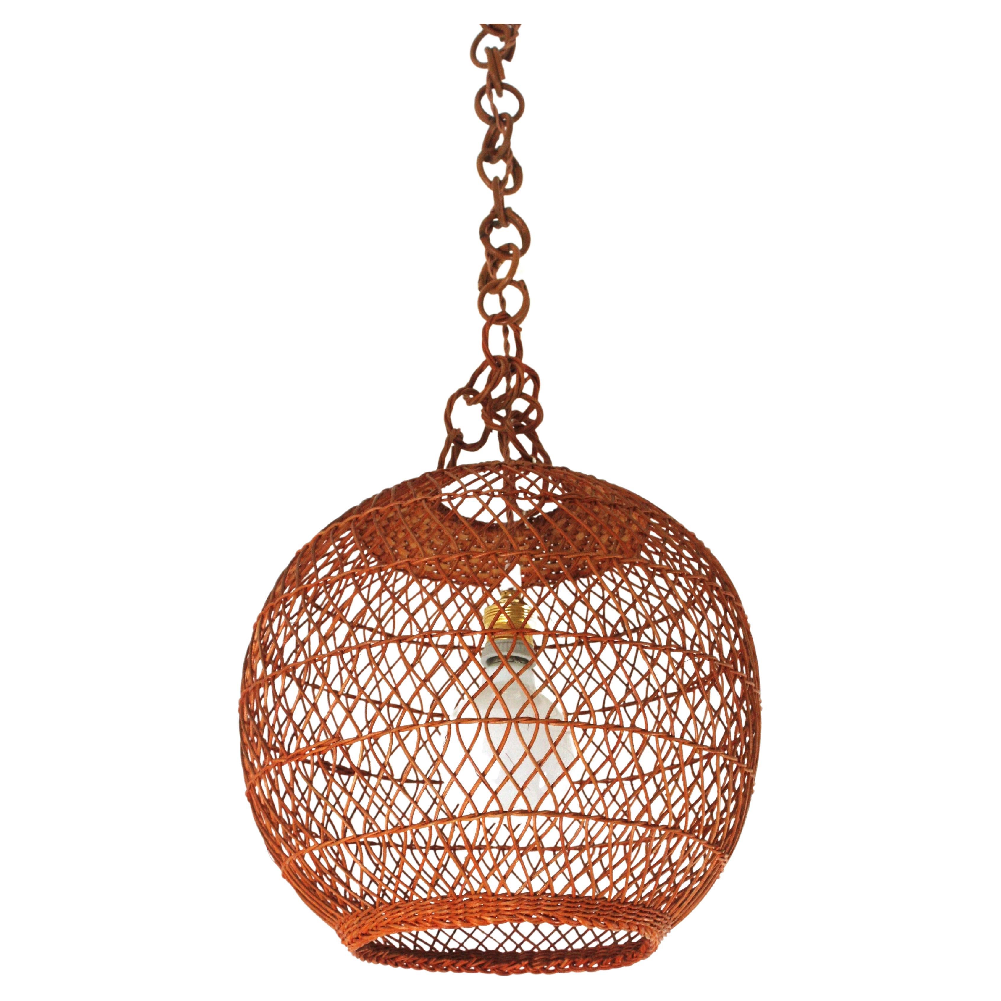 Spanish Handwoven Wicker Rattan Globe Pendant Light / Lantern For Sale