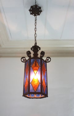 Hexagonal Lantern in Wrought Iron With Orange and Blue Glasses, Spain 1940s