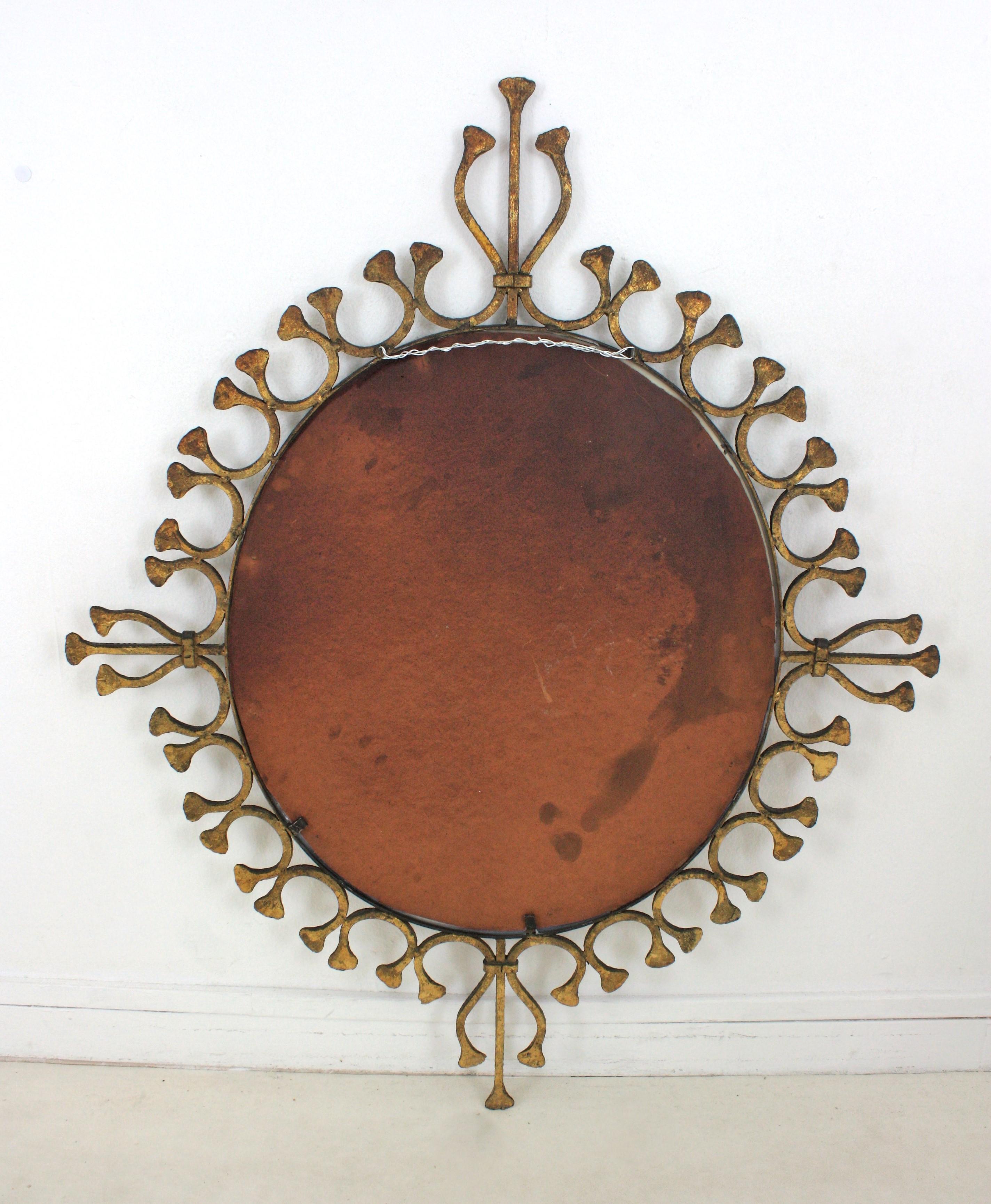 Spanish Hollywood Regency Gilt Wrought Iron Oval Sunburst Mirror / Wall Mirror For Sale 5