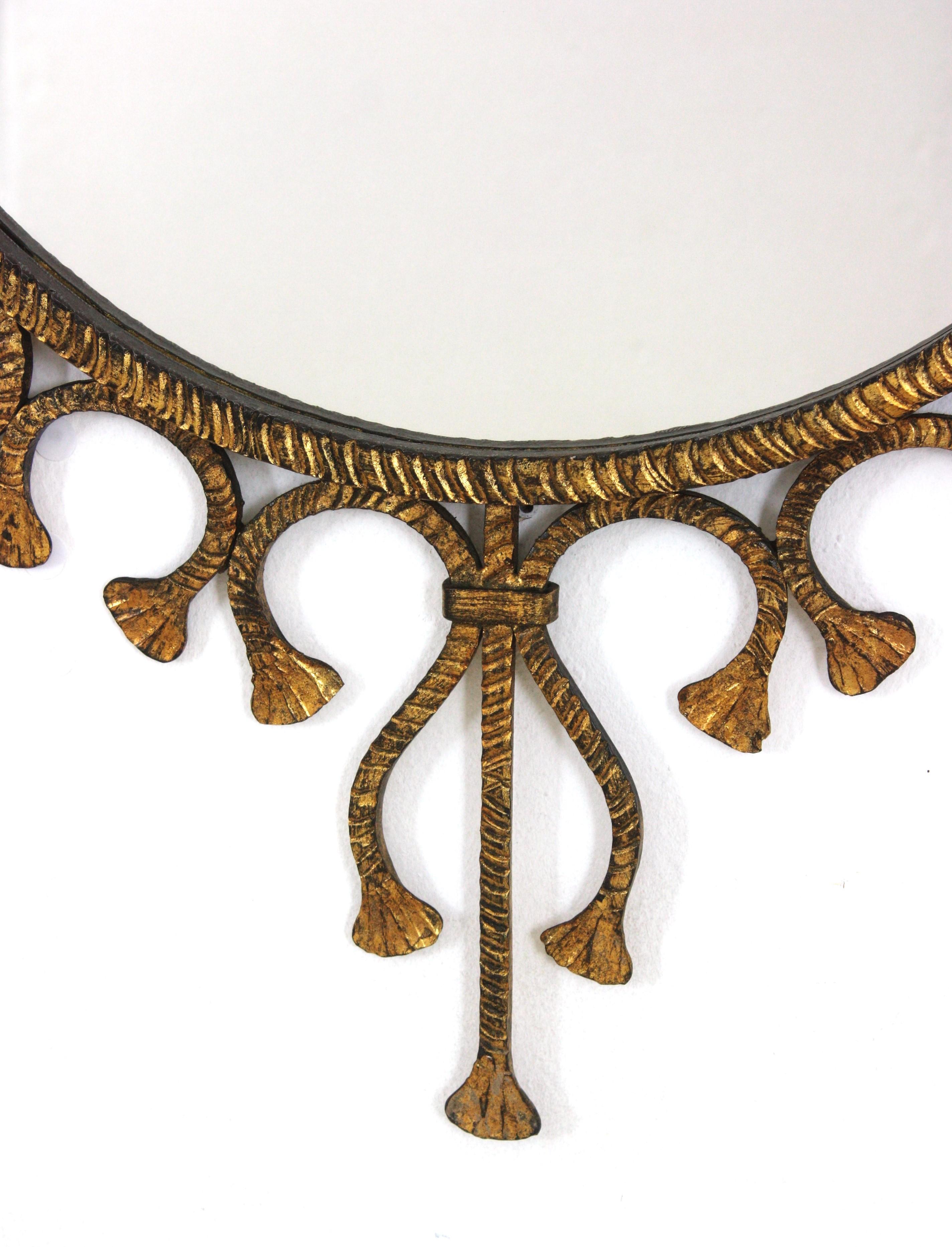 Forged Spanish Hollywood Regency Gilt Wrought Iron Oval Sunburst Mirror / Wall Mirror For Sale