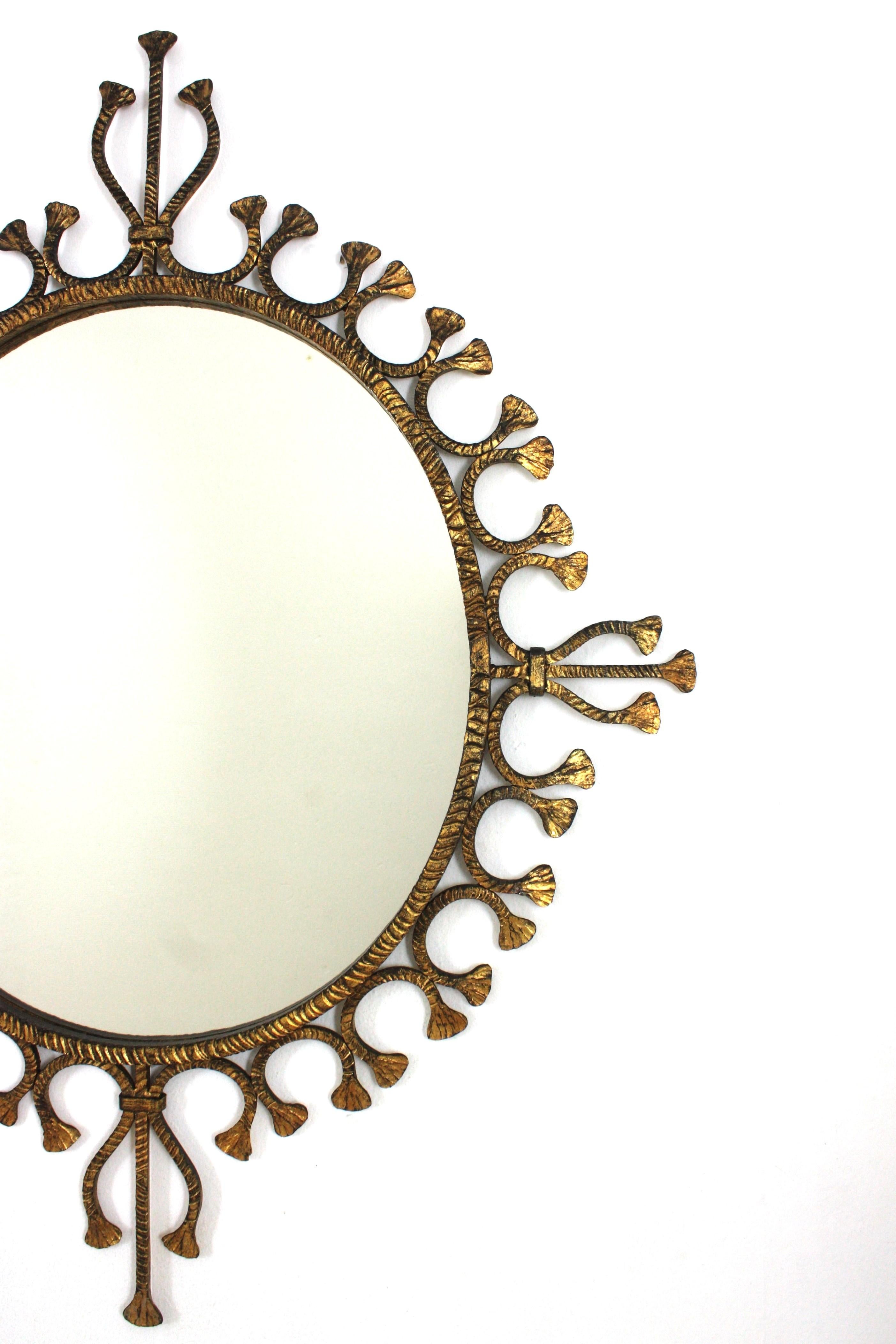Spanish Hollywood Regency Gilt Wrought Iron Oval Sunburst Mirror / Wall Mirror For Sale 1