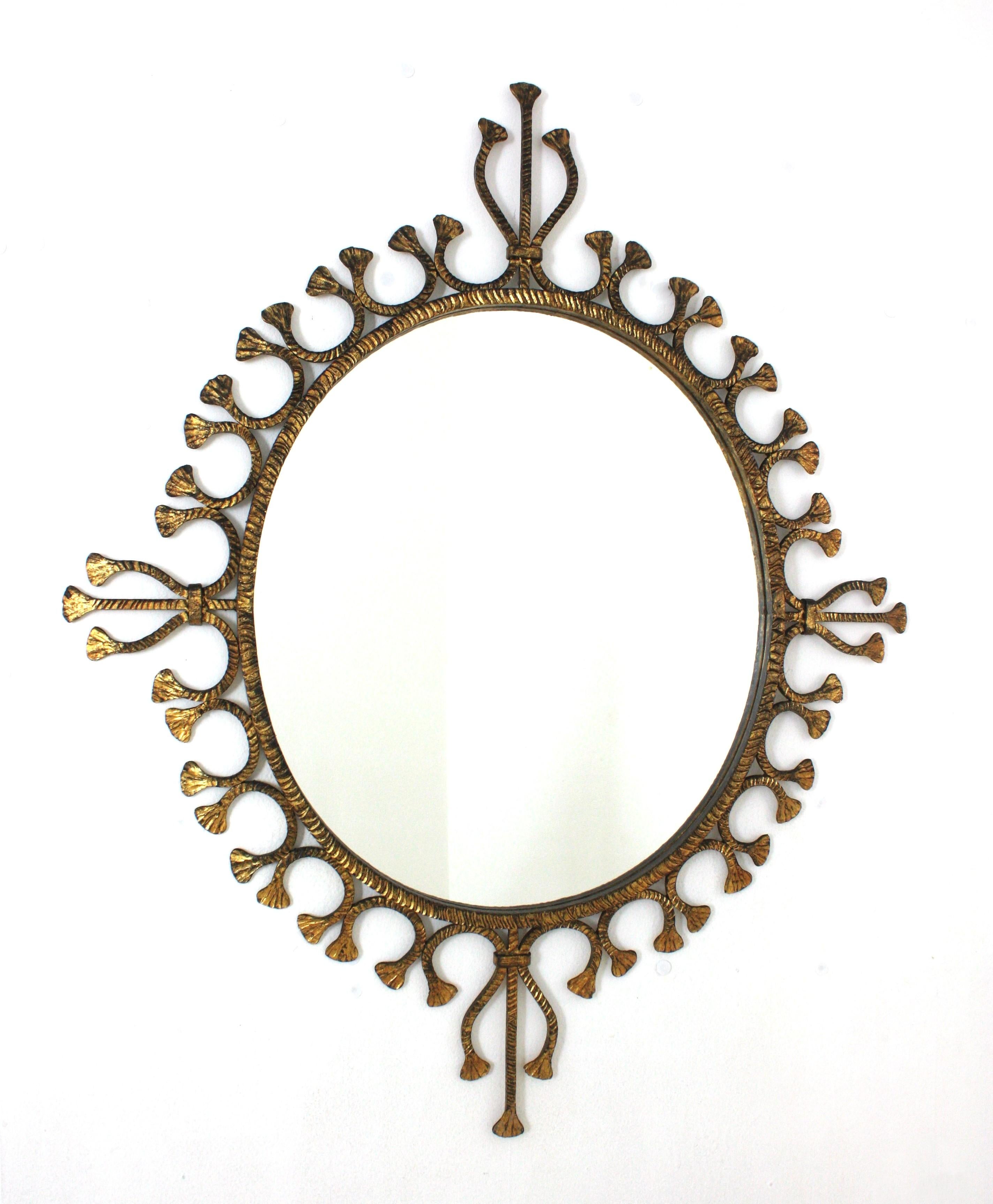 Spanish Hollywood Regency Gilt Wrought Iron Oval Sunburst Mirror / Wall Mirror For Sale 3