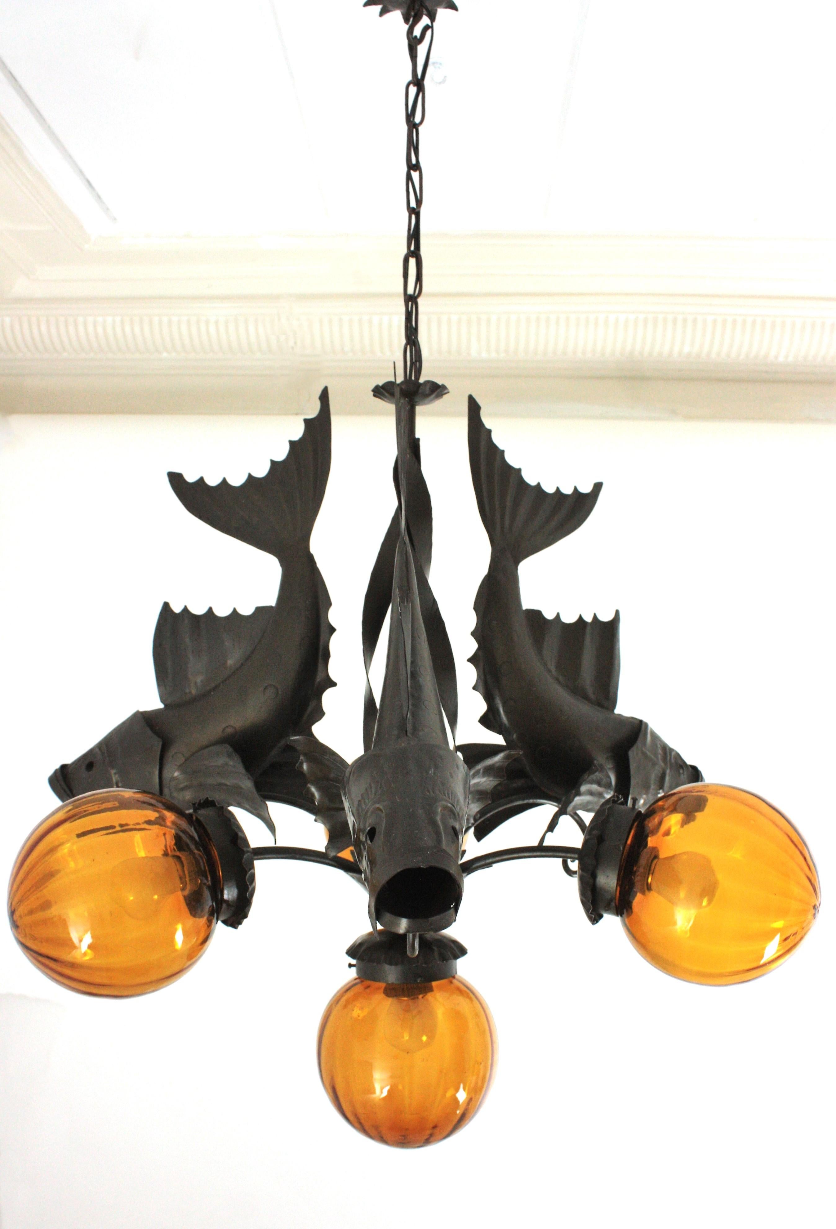 Spanish Wrought Iron and Amber Glass Chandelier, Fish Design For Sale 4