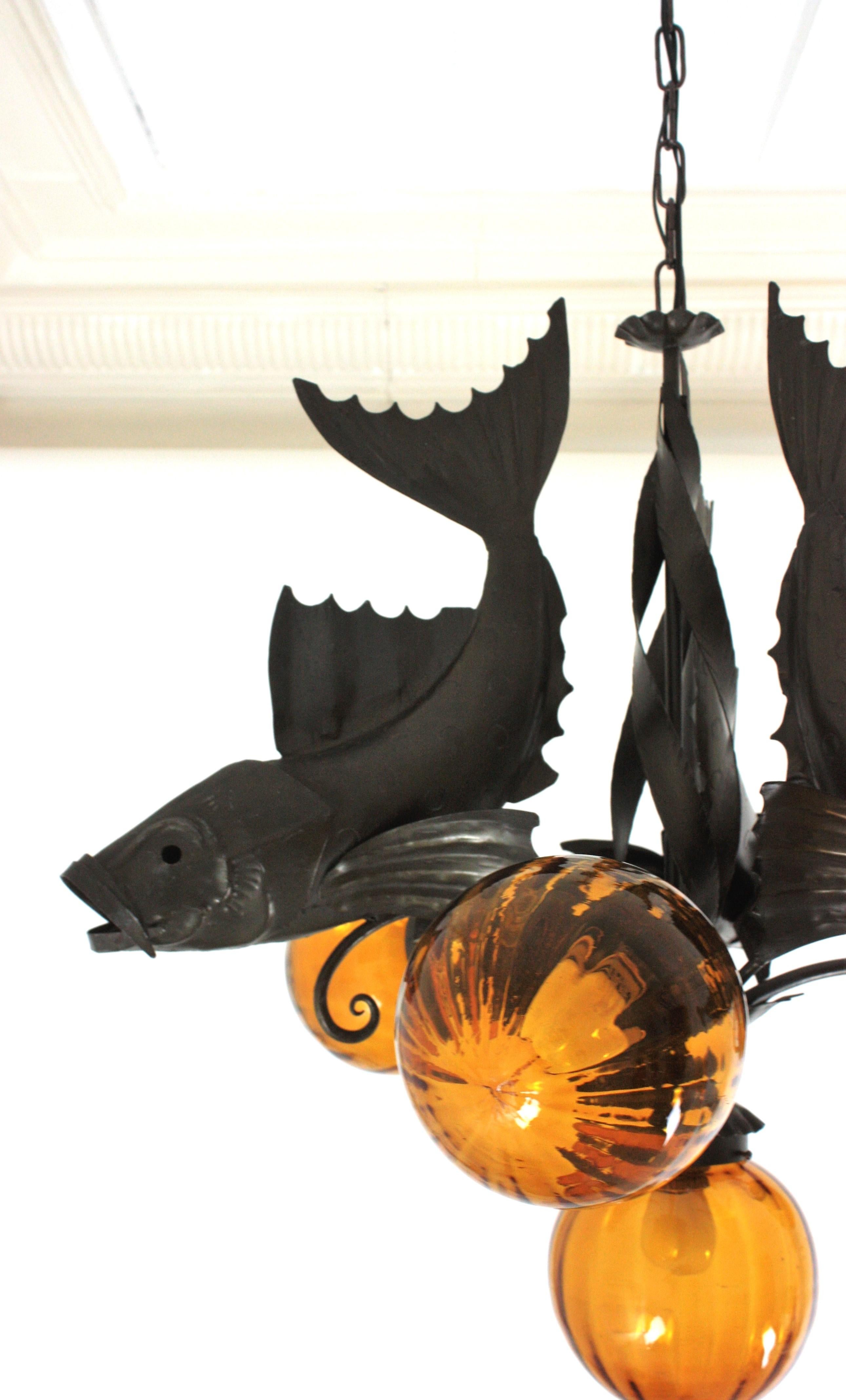 Spanish Wrought Iron and Amber Glass Chandelier, Fish Design For Sale 7
