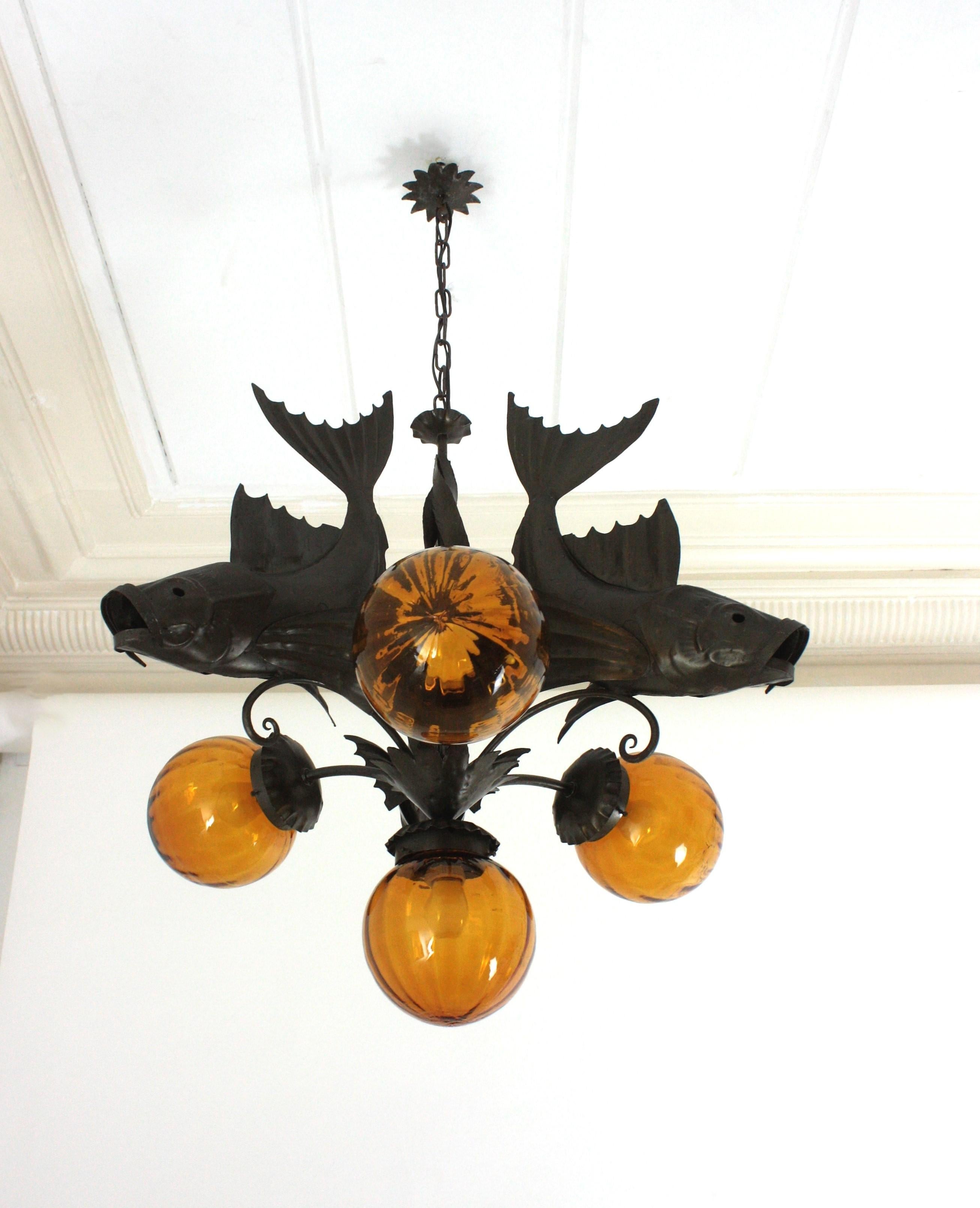 Spanish Wrought Iron and Amber Glass Chandelier, Fish Design For Sale 11