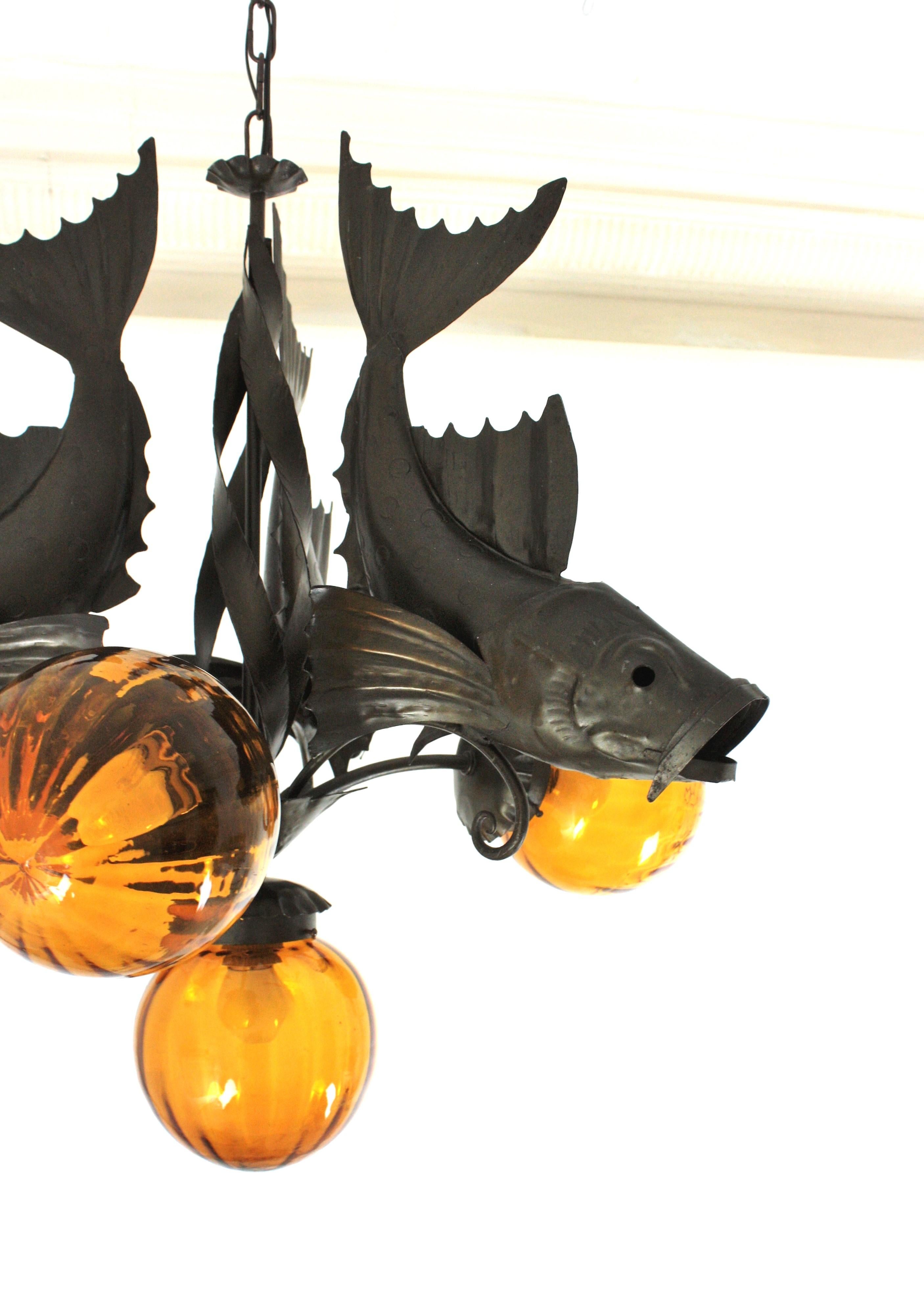 Spanish Wrought Iron and Amber Glass Chandelier, Fish Design In Good Condition For Sale In Barcelona, ES