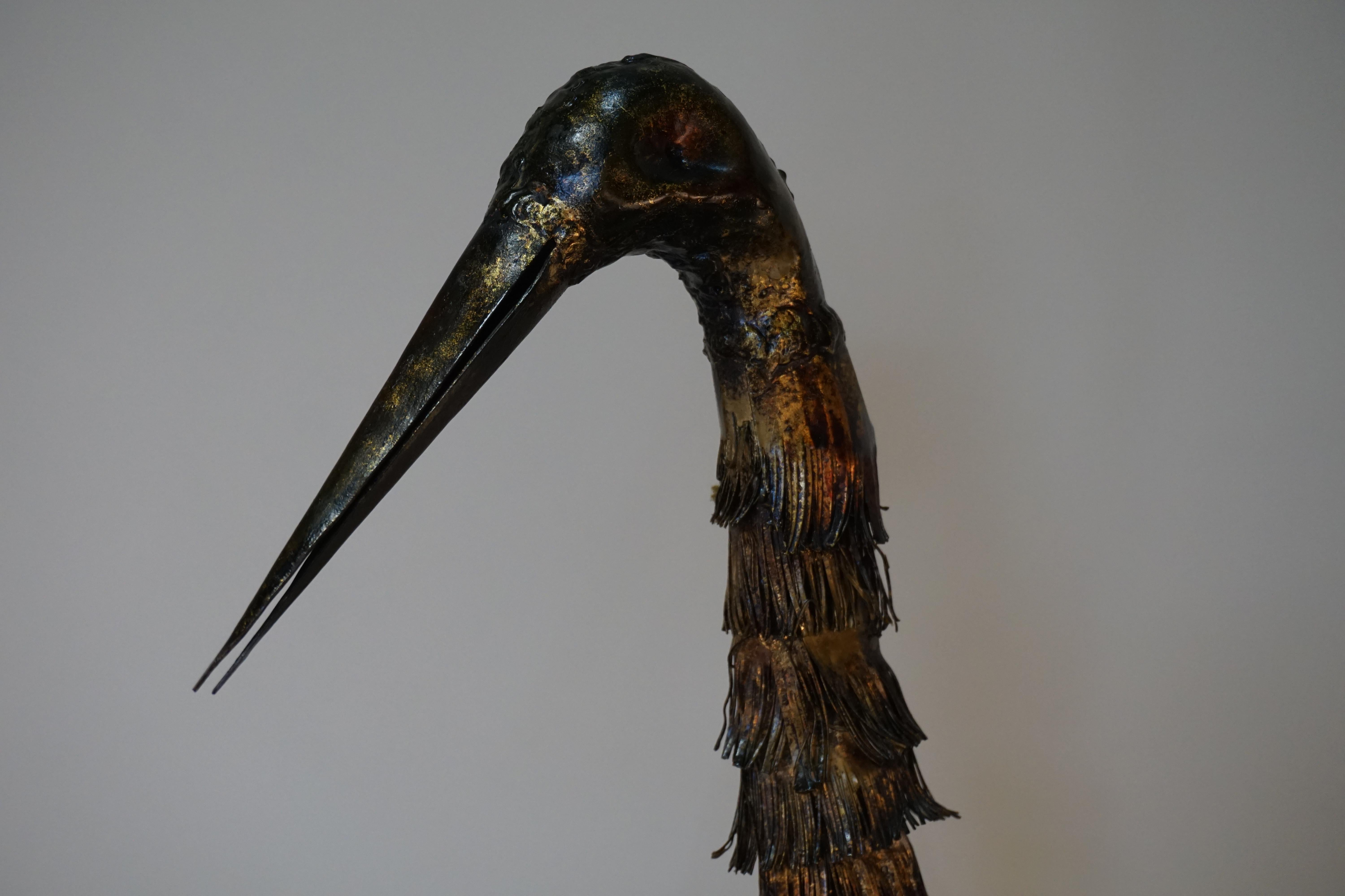 Handcrafted in Spain, long legged bird iron sculpture.