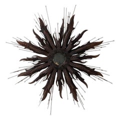 Vieux miroir en fer martelé Sunburst ou Starburst